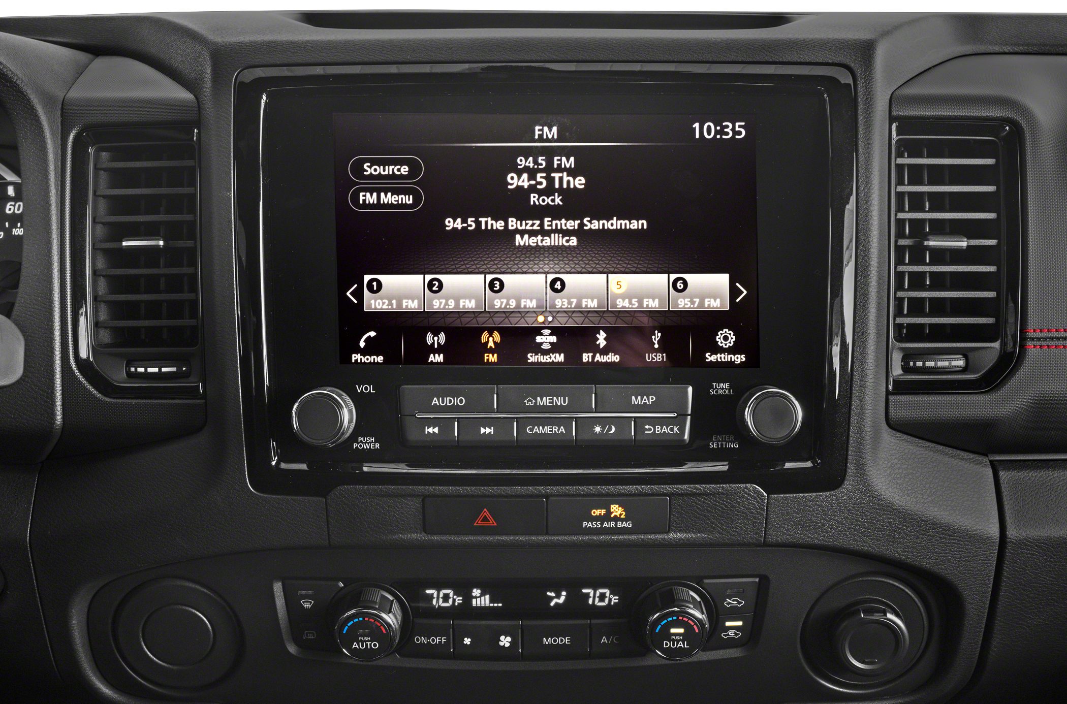 Touchscreen infotainment and dual-zone climate control panel