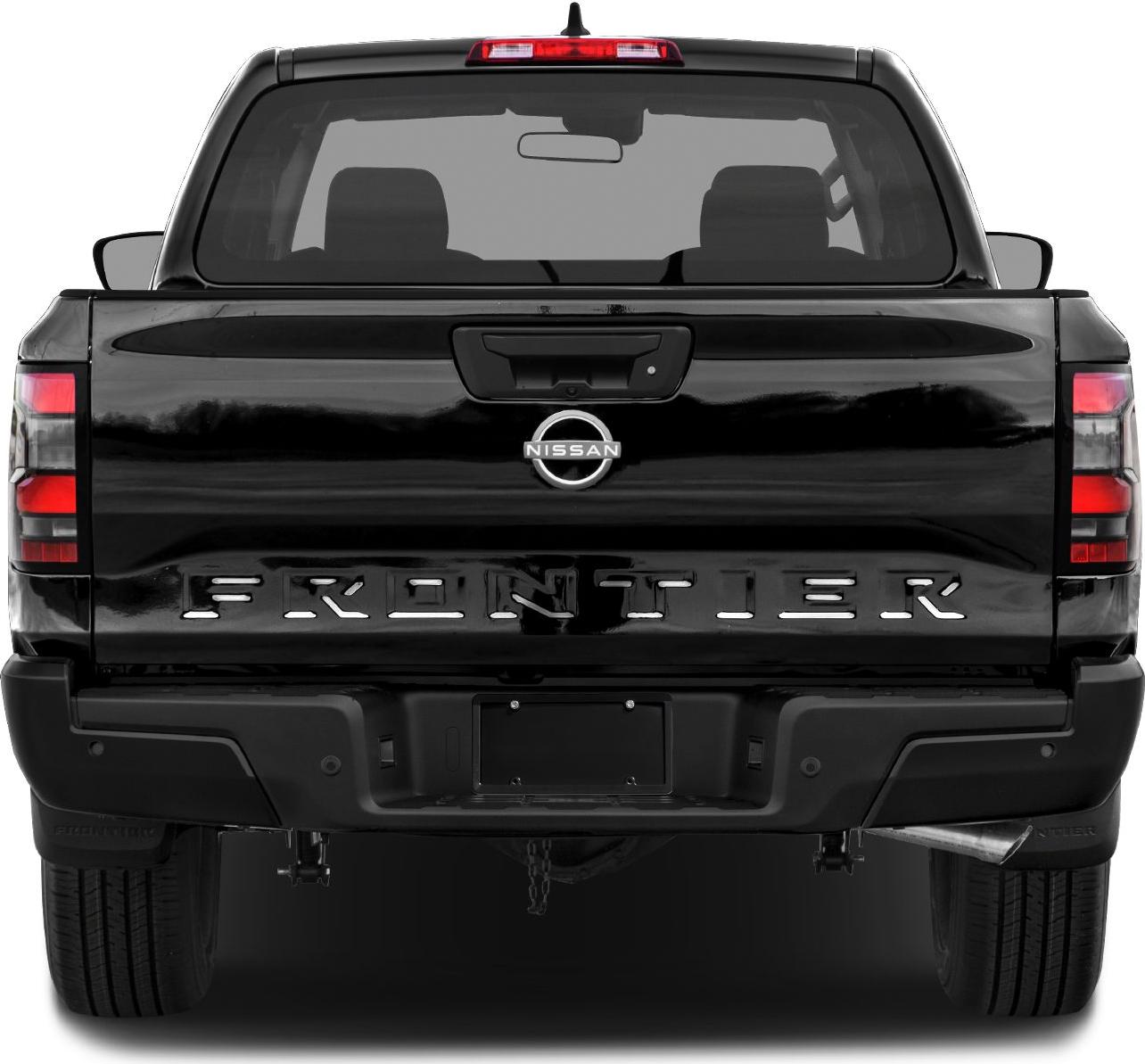 Rear view of pickup tailgate with distinctive lettering and modern taillights