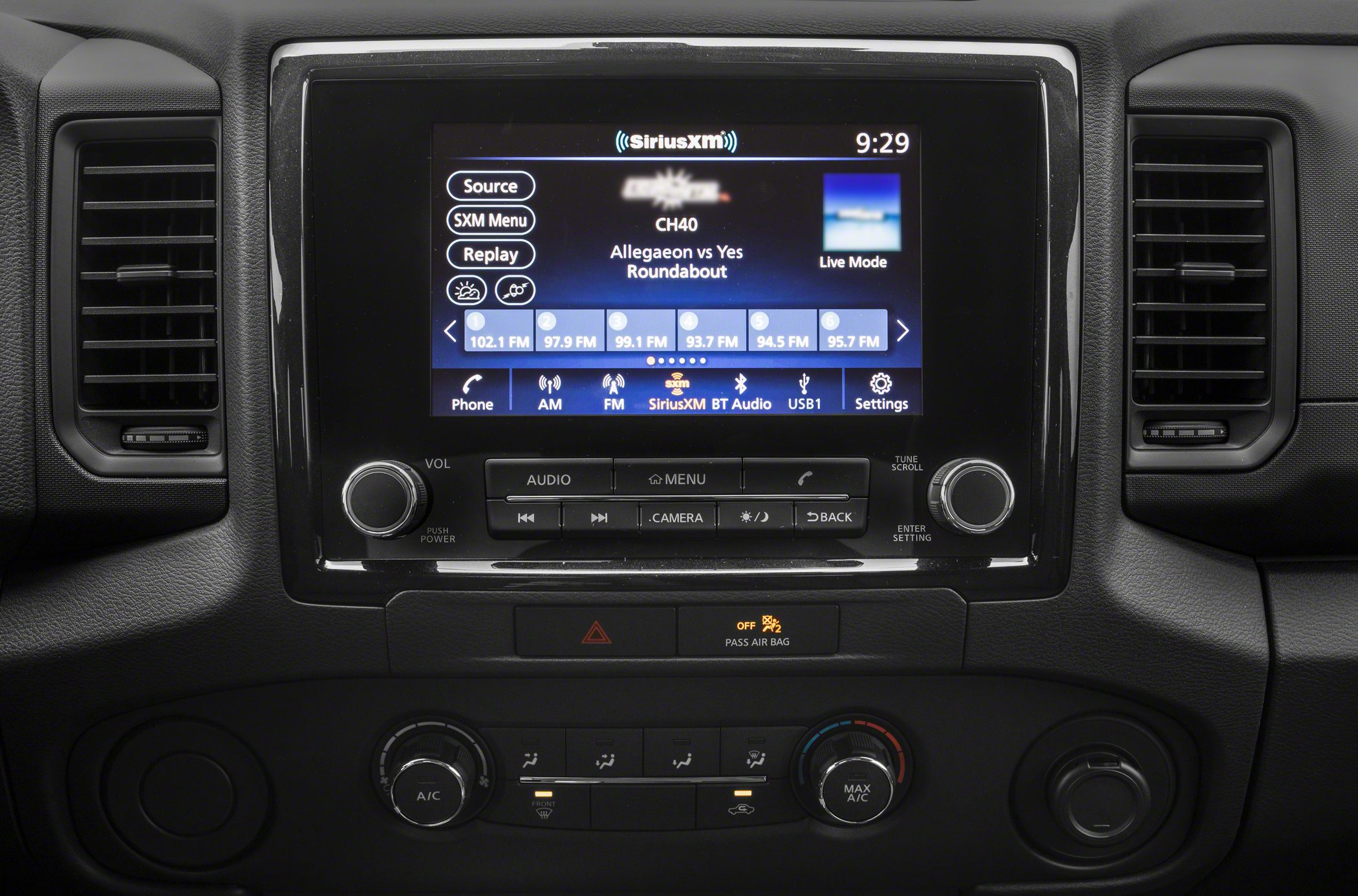 Infotainment touchscreen with radio and climate control knobs