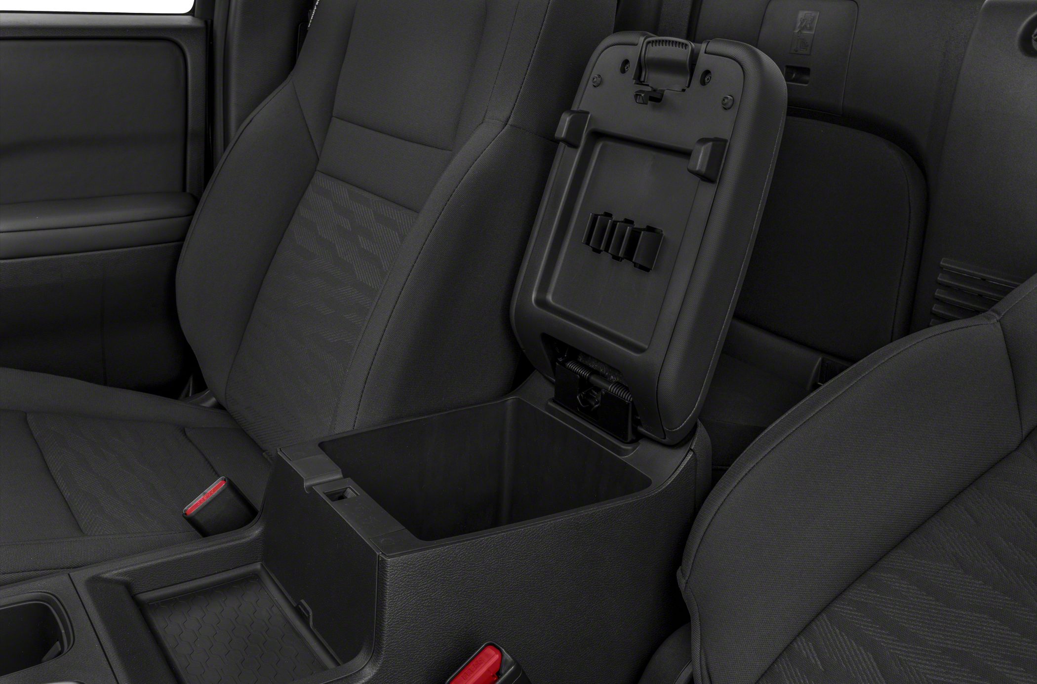 Open center console storage compartment between truck seats