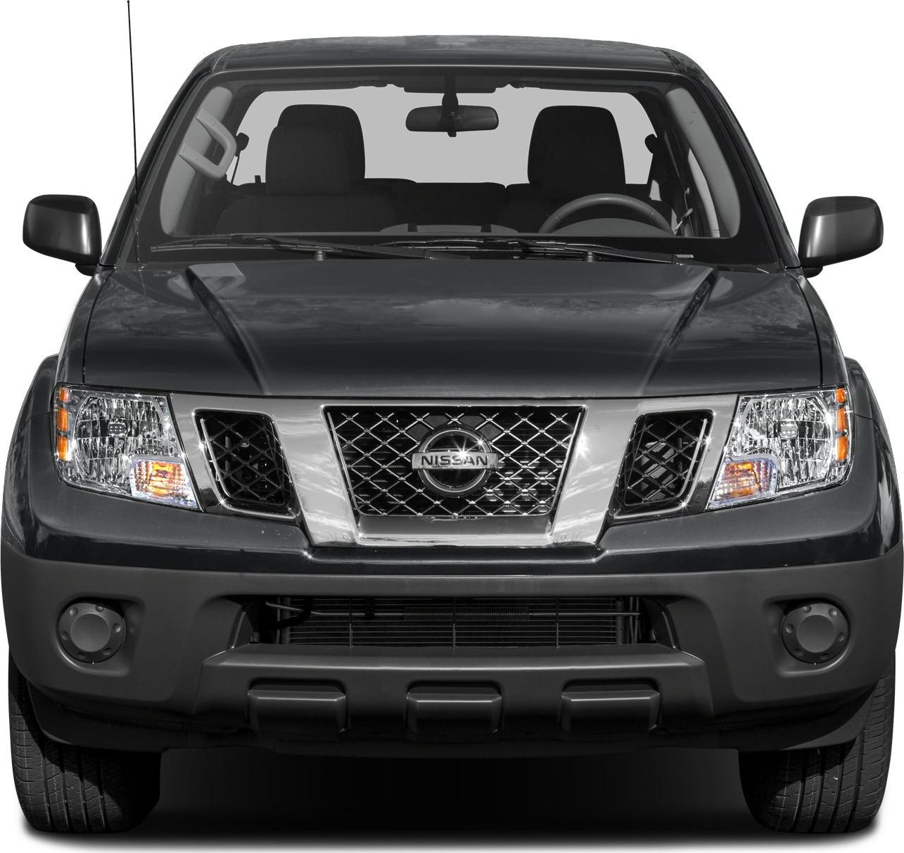 Front view of a pickup truck with chrome mesh grille and rectangular headlights