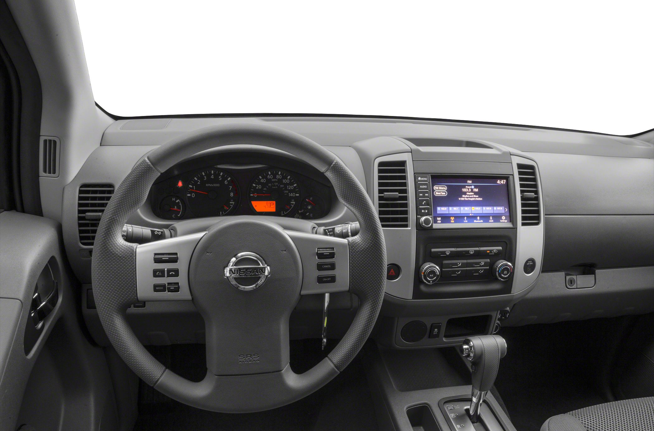 Dashboard and steering wheel with infotainment system and control buttons