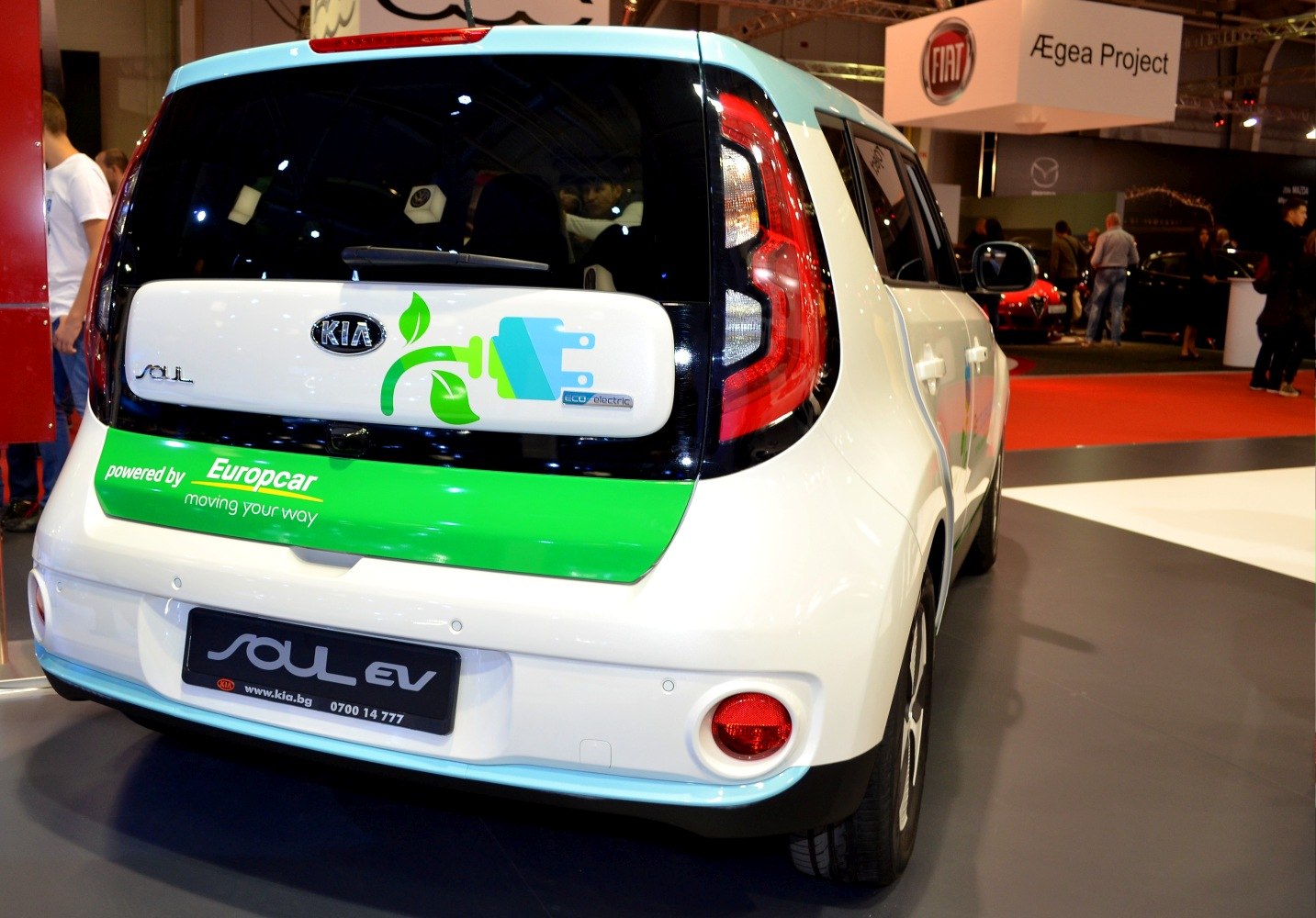 Electric vehicle rear with eco branding and distinctive taillights