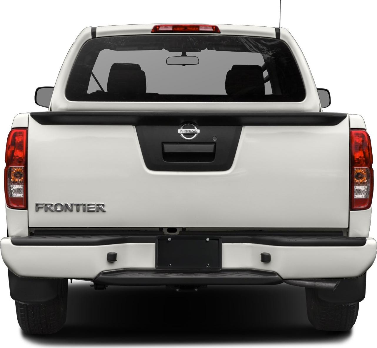 Tailgate and rear bumper of a pickup truck with distinct rear lights.