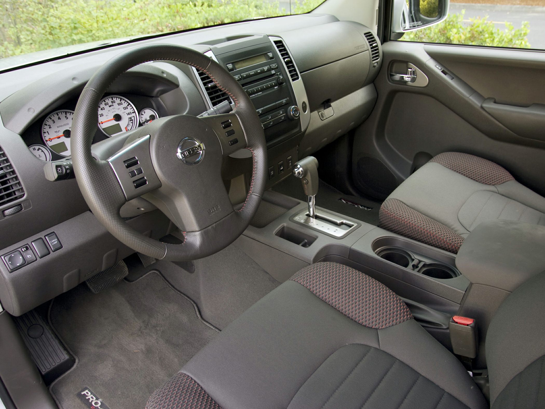 Dashboard and center console with steering wheel and automatic gear shifter