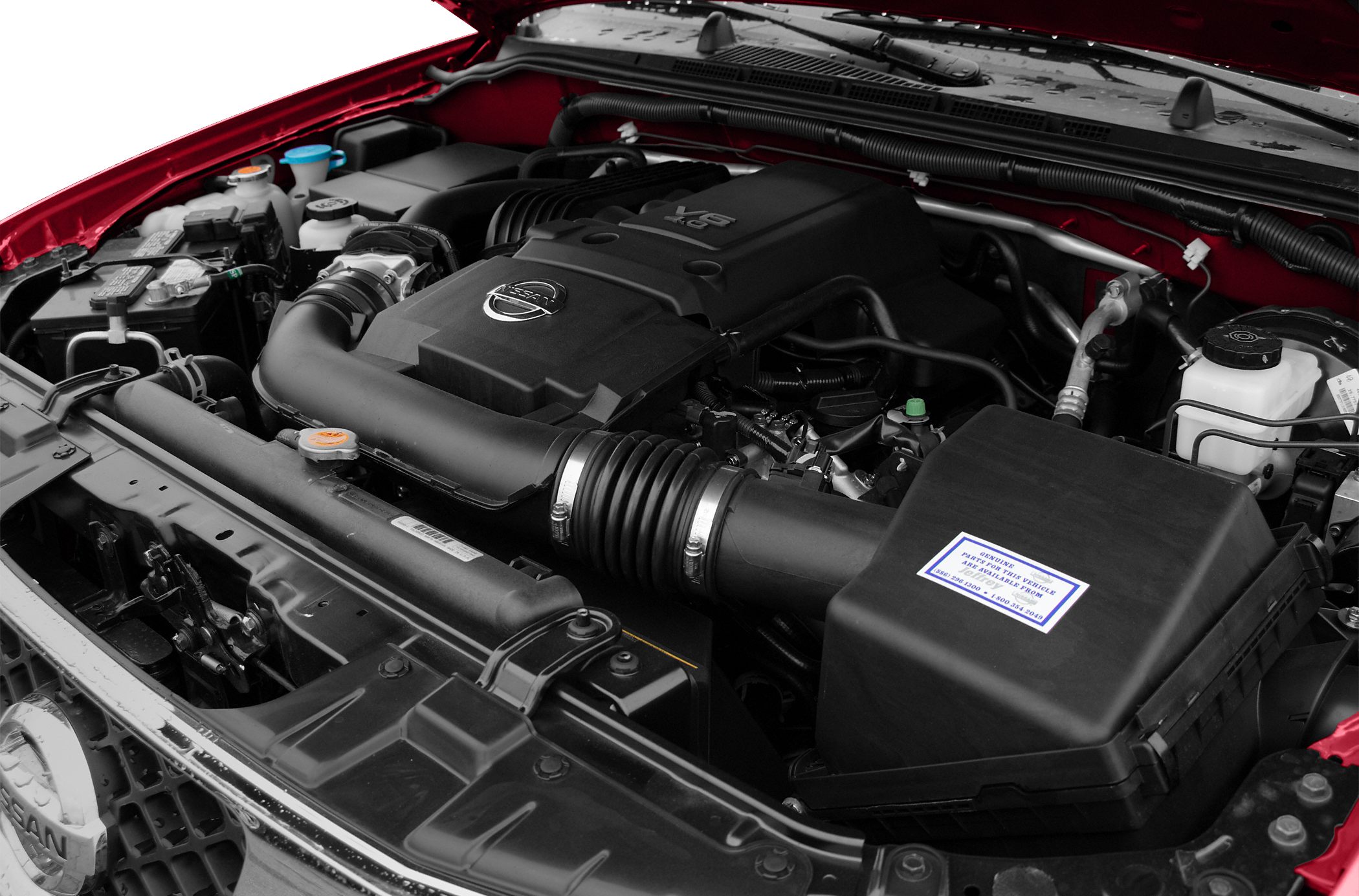 V6 engine bay with detailed components in a pickup truck