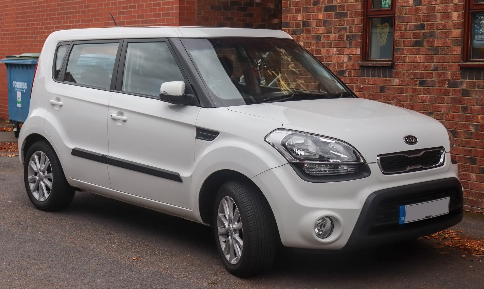 White compact hatchback with boxy design and alloy wheels