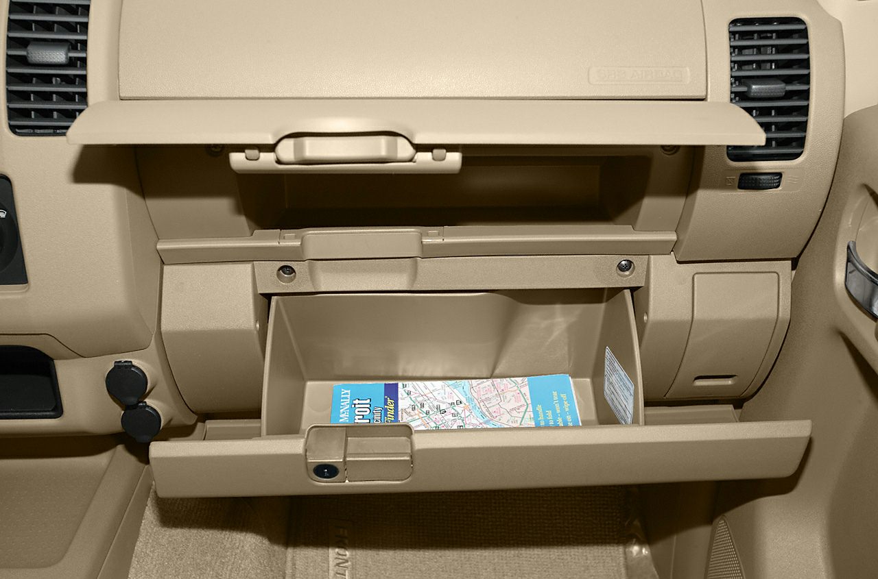 Beige dual glove box storage with map inside