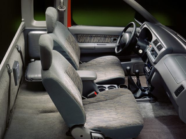 Fabric seats, manual transmission, functional truck dashboard, front cabin interior