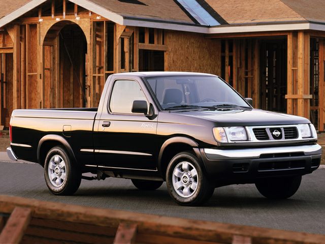 Front-side view of regular cab pickup truck with black paint