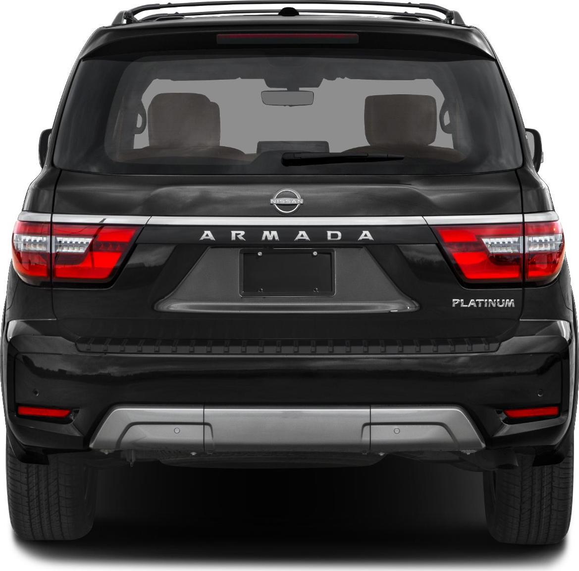 Rear view of SUV with taillights, chrome trim, and roof rails