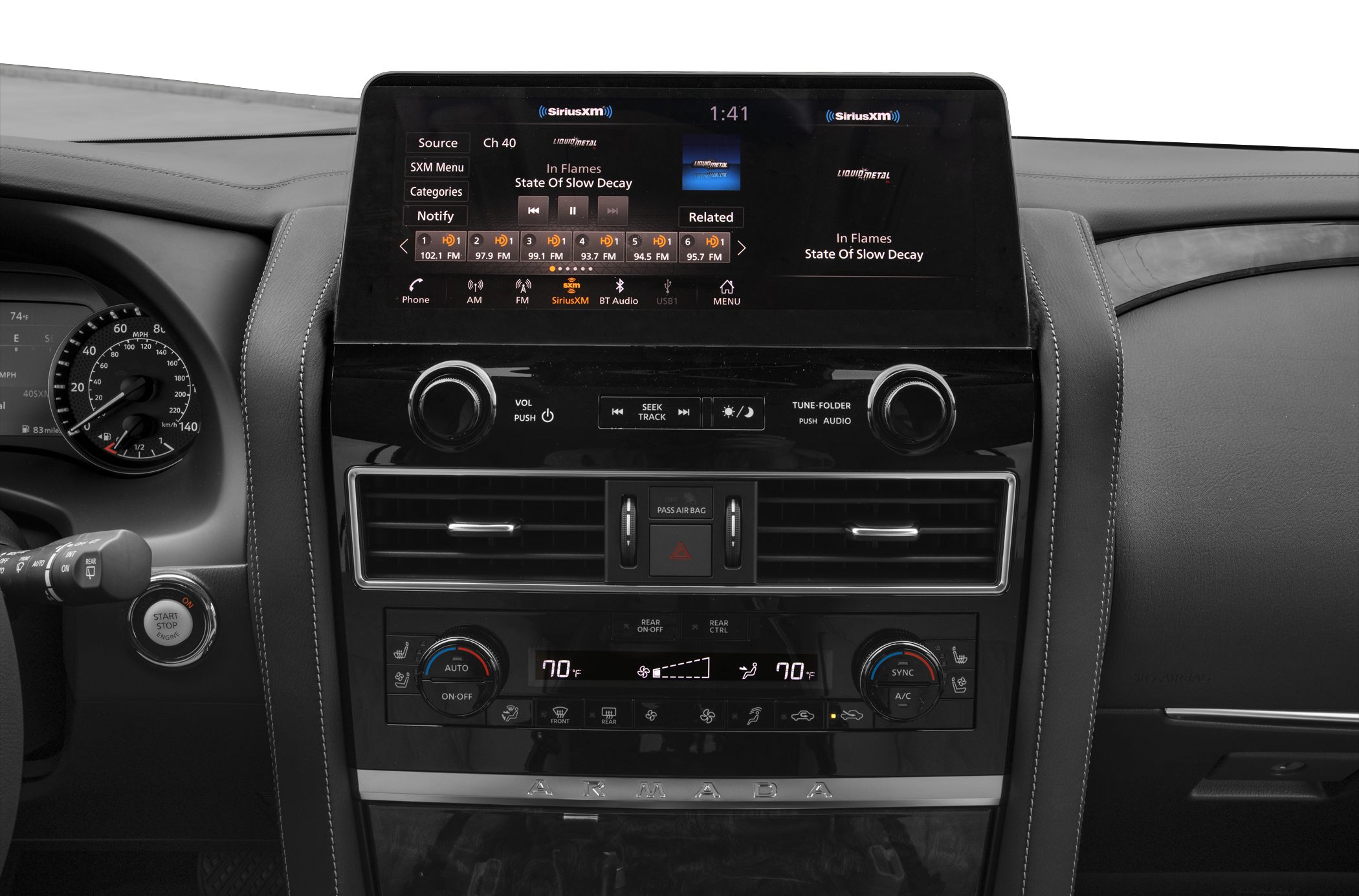 Infotainment display and dual-zone climate control panel with start-stop engine button.