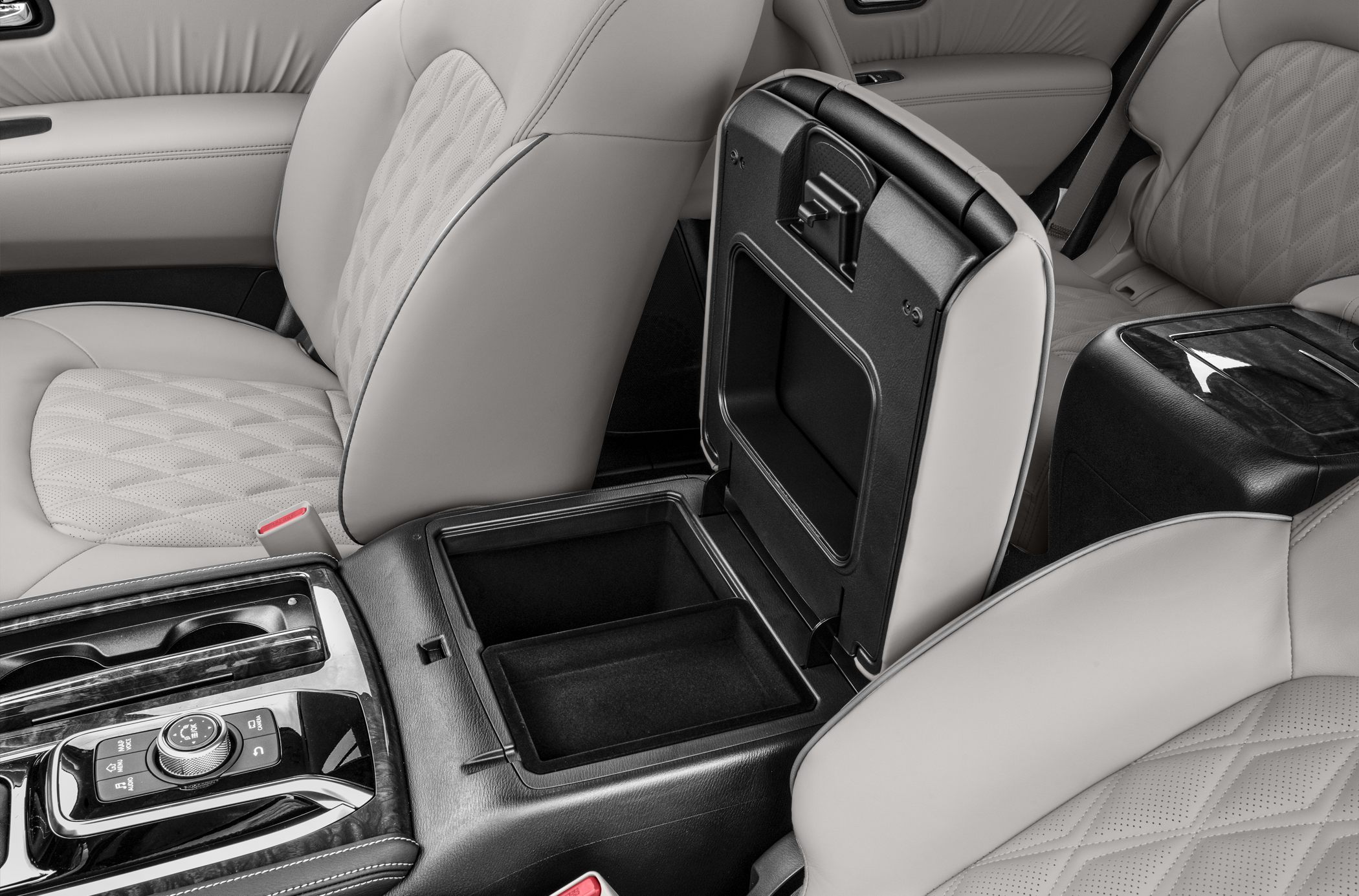 Center console compartment with quilted leather seats