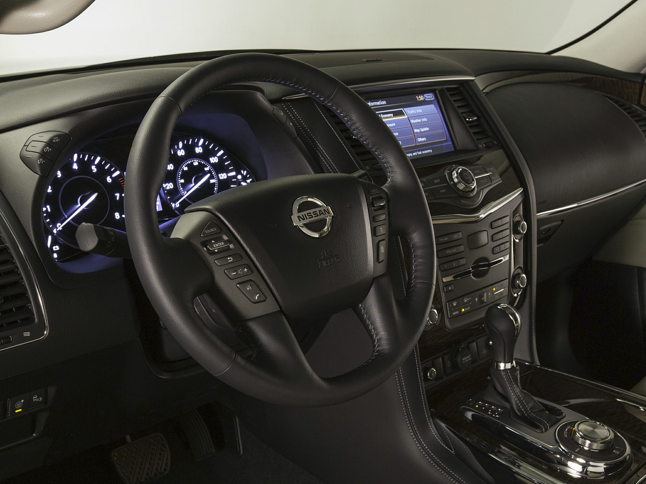 Luxury steering wheel and dashboard with infotainment and controls