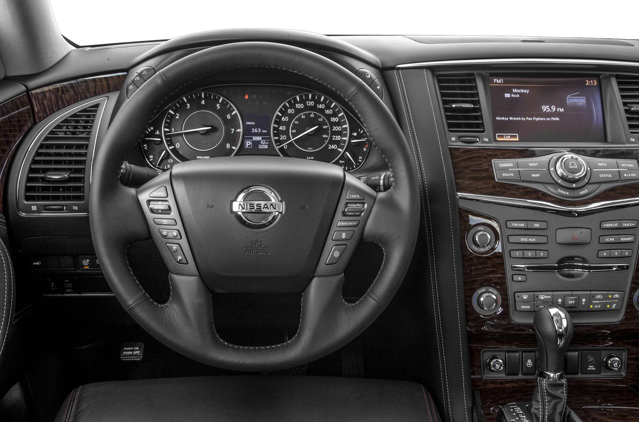 Steering wheel with instrument cluster and media console