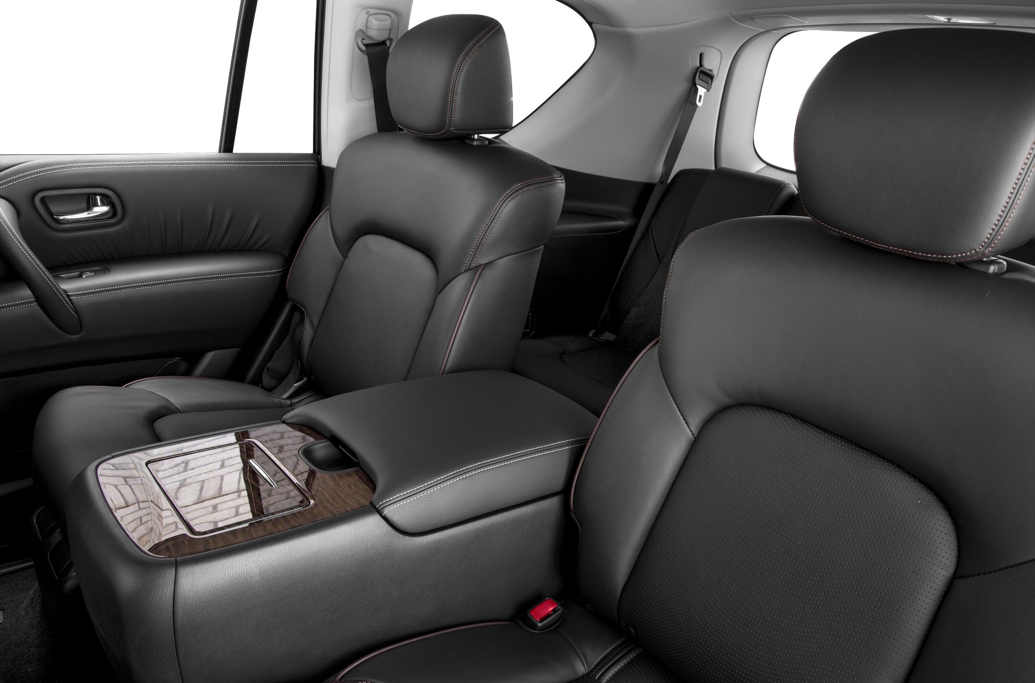 Black leather seats and wood trim center console with contrast stitching