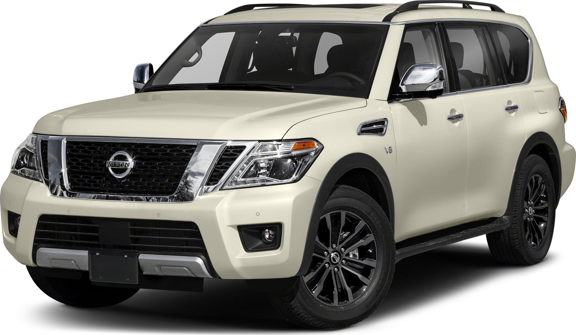 Front side view of SUV with chrome grille and black alloy wheels