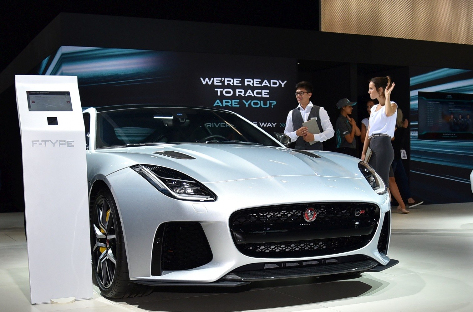 Sporty front grille and sharp headlights of a coupe