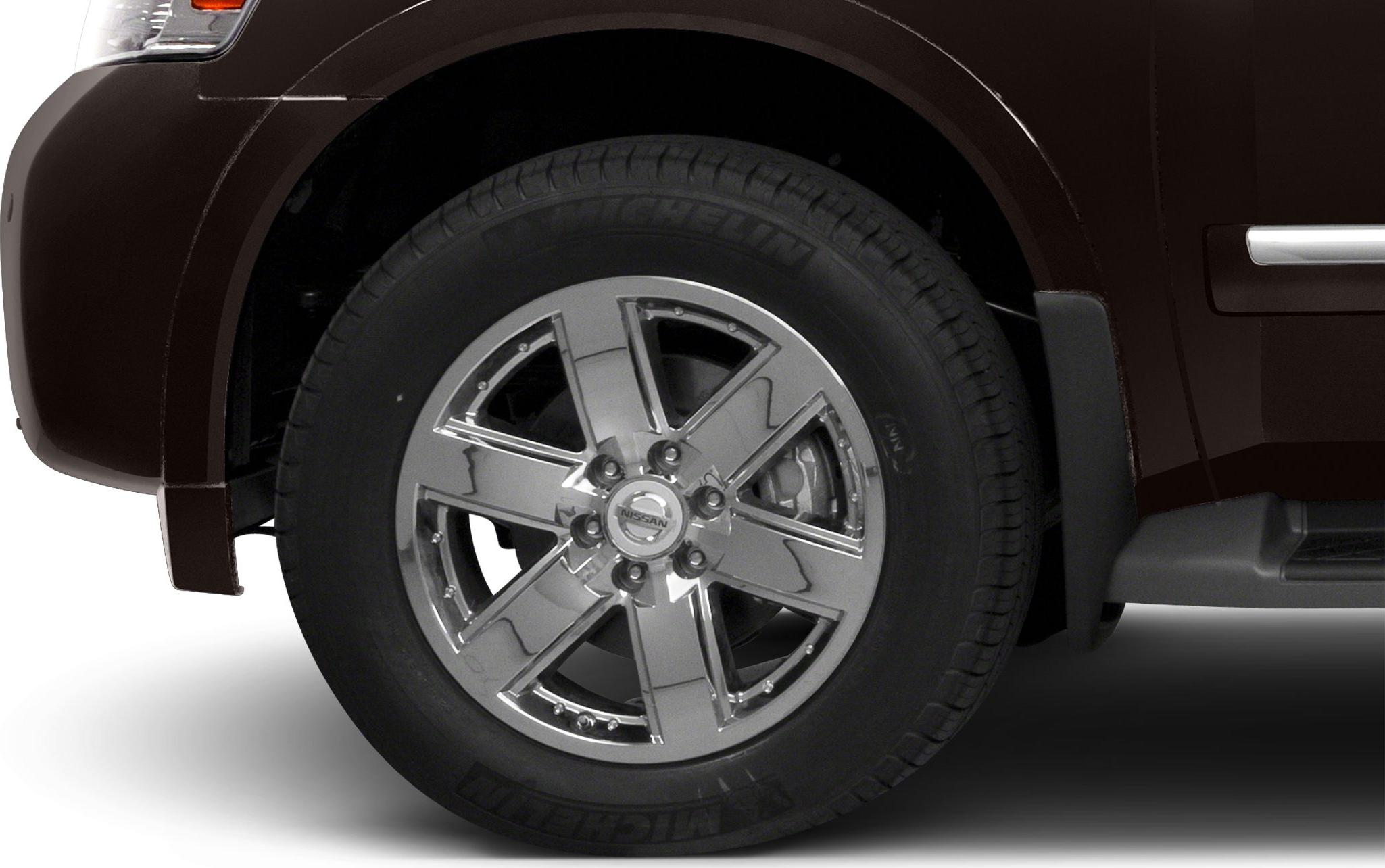 Chrome alloy wheel and Michelin tire on SUV front side