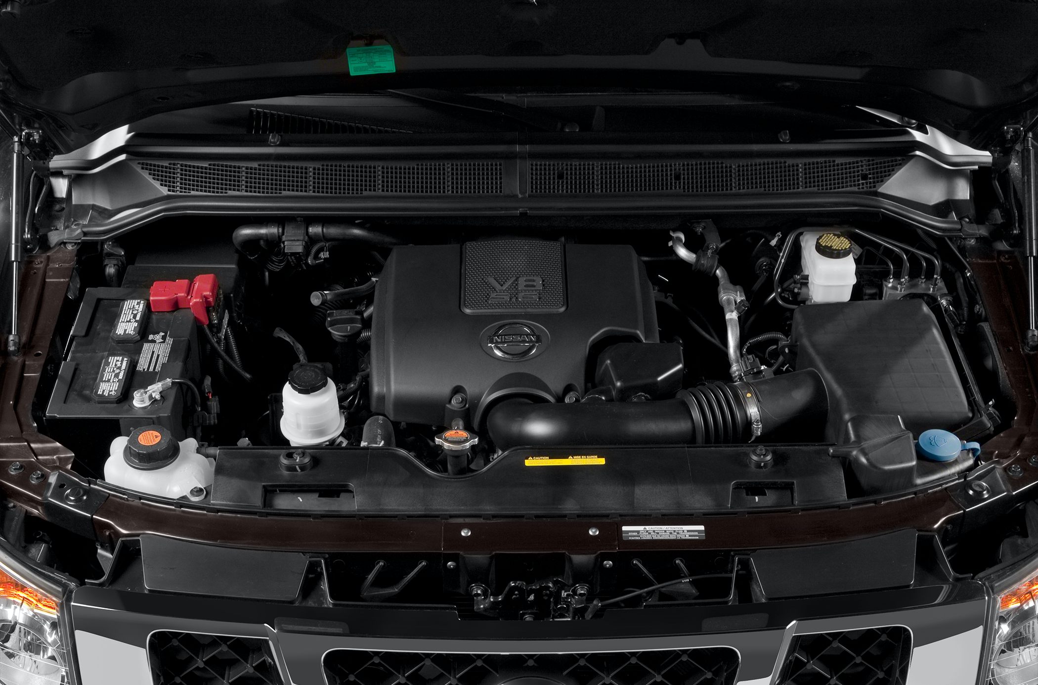 V8 engine compartment with detailed components and layout under open hood