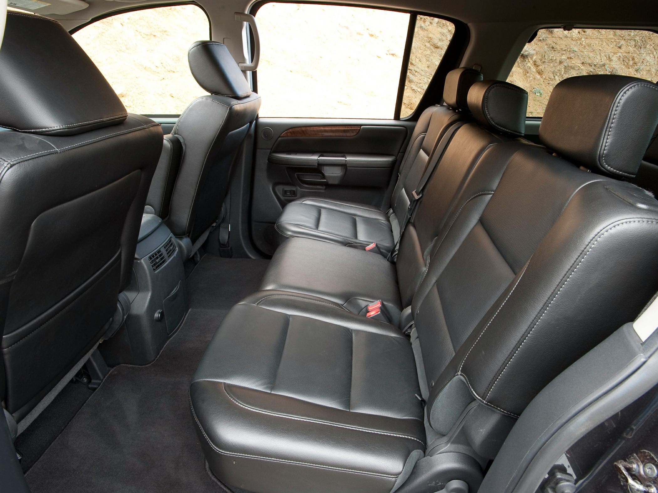Leather rear seats and spacious SUV interior with detailed stitching