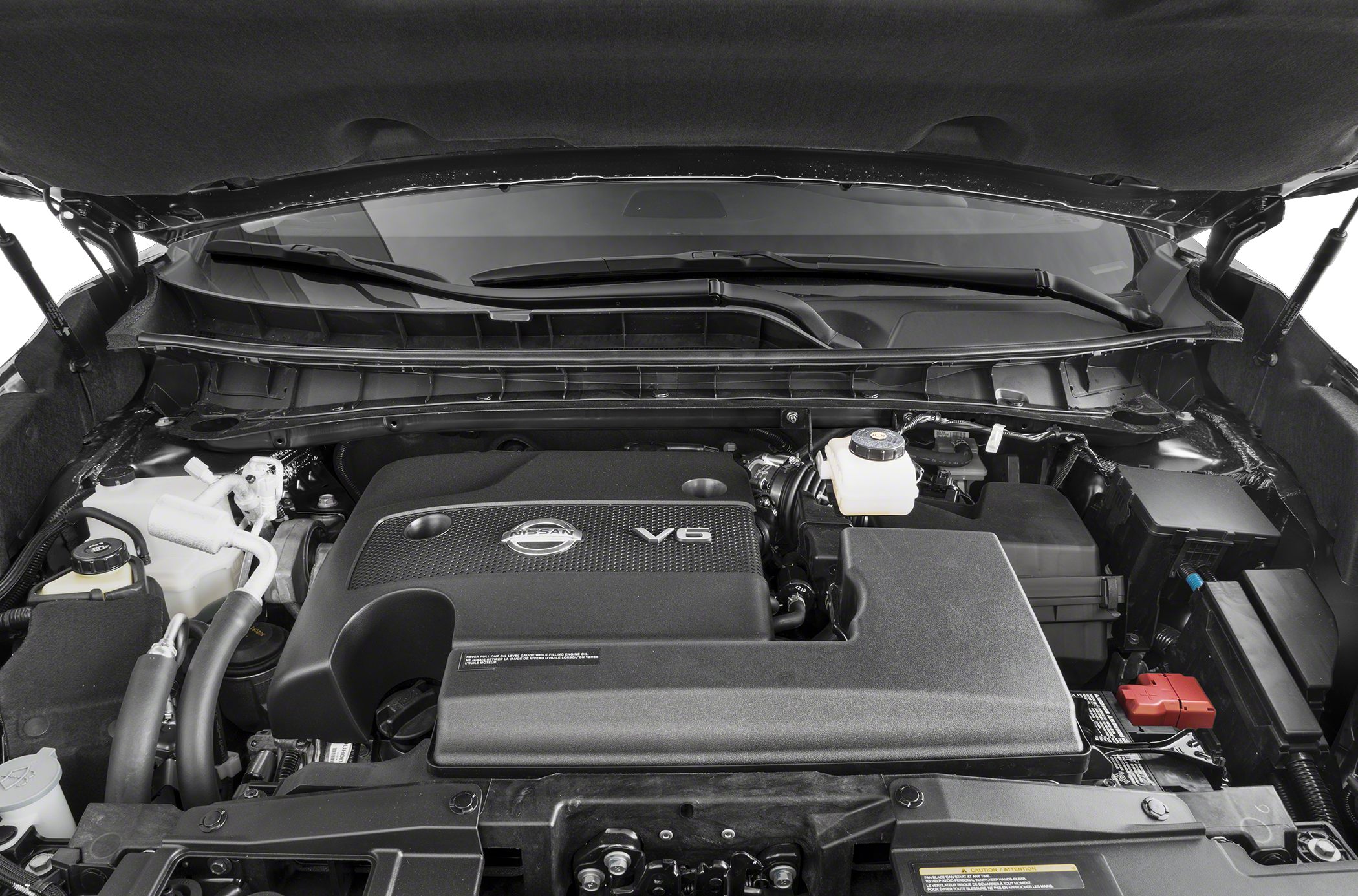 V6 engine bay with Nissan branded engine cover and powertrain components