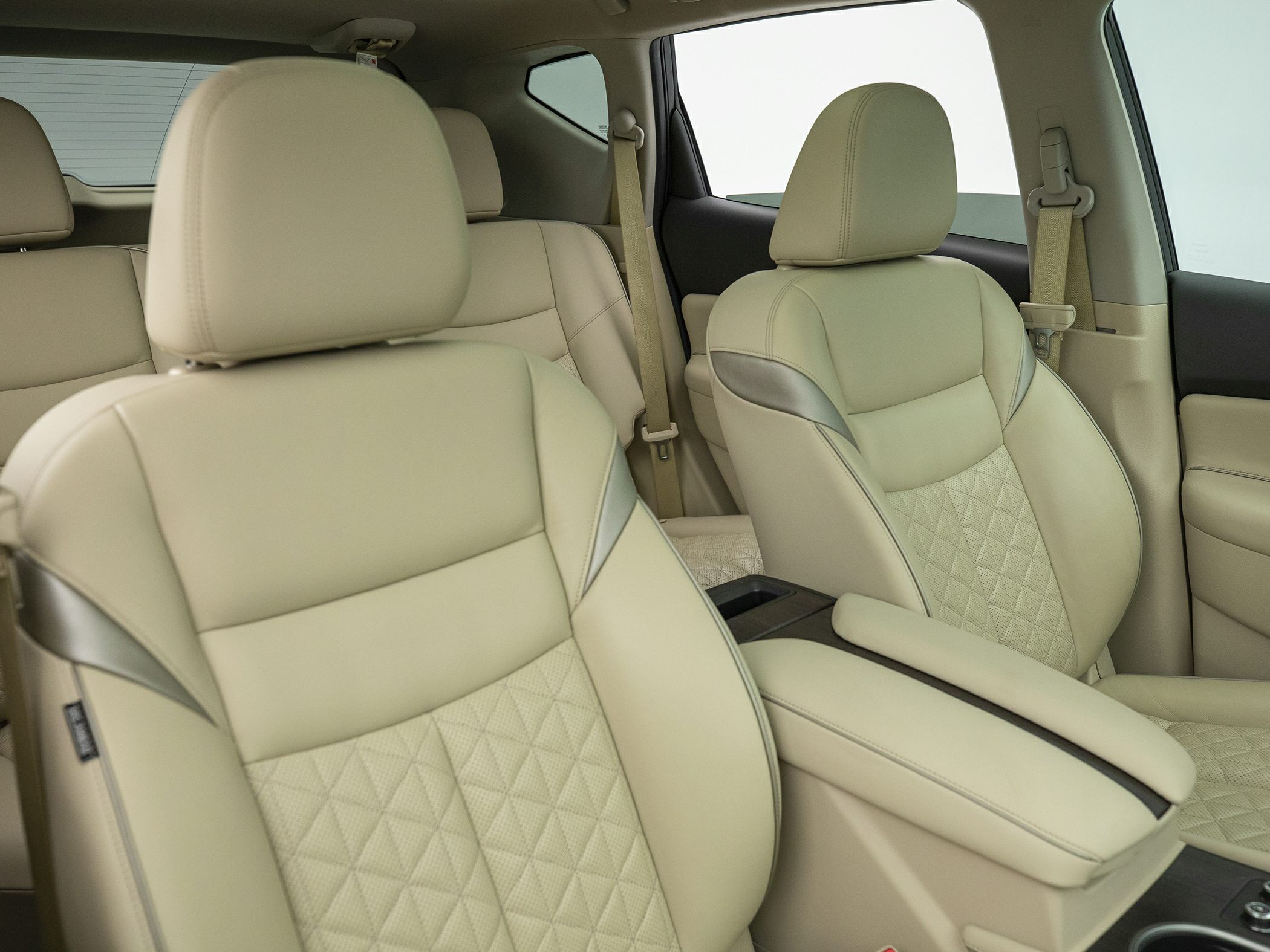 Beige leather quilted front seats with gray accents