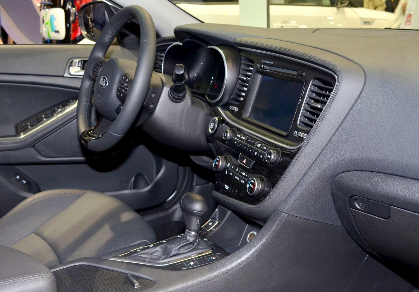 Modern car interior with dashboard and automatic gear shift