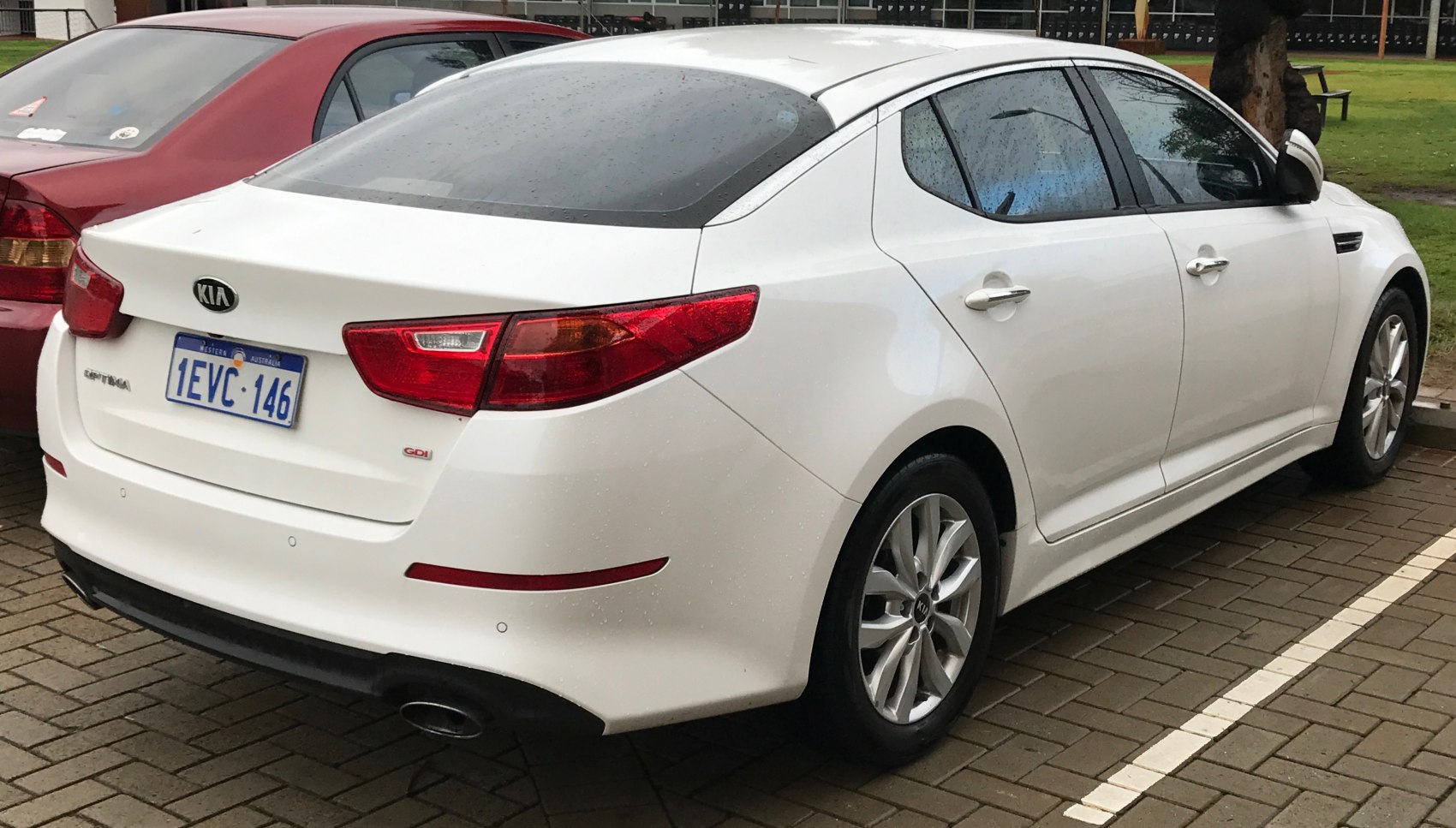 Rear side view with taillights and alloy wheels