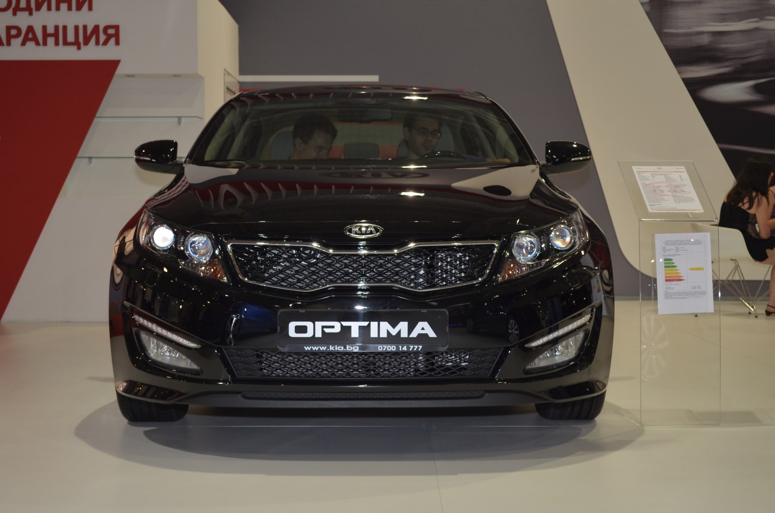 Front view with signature grille and LED headlights of a sedan