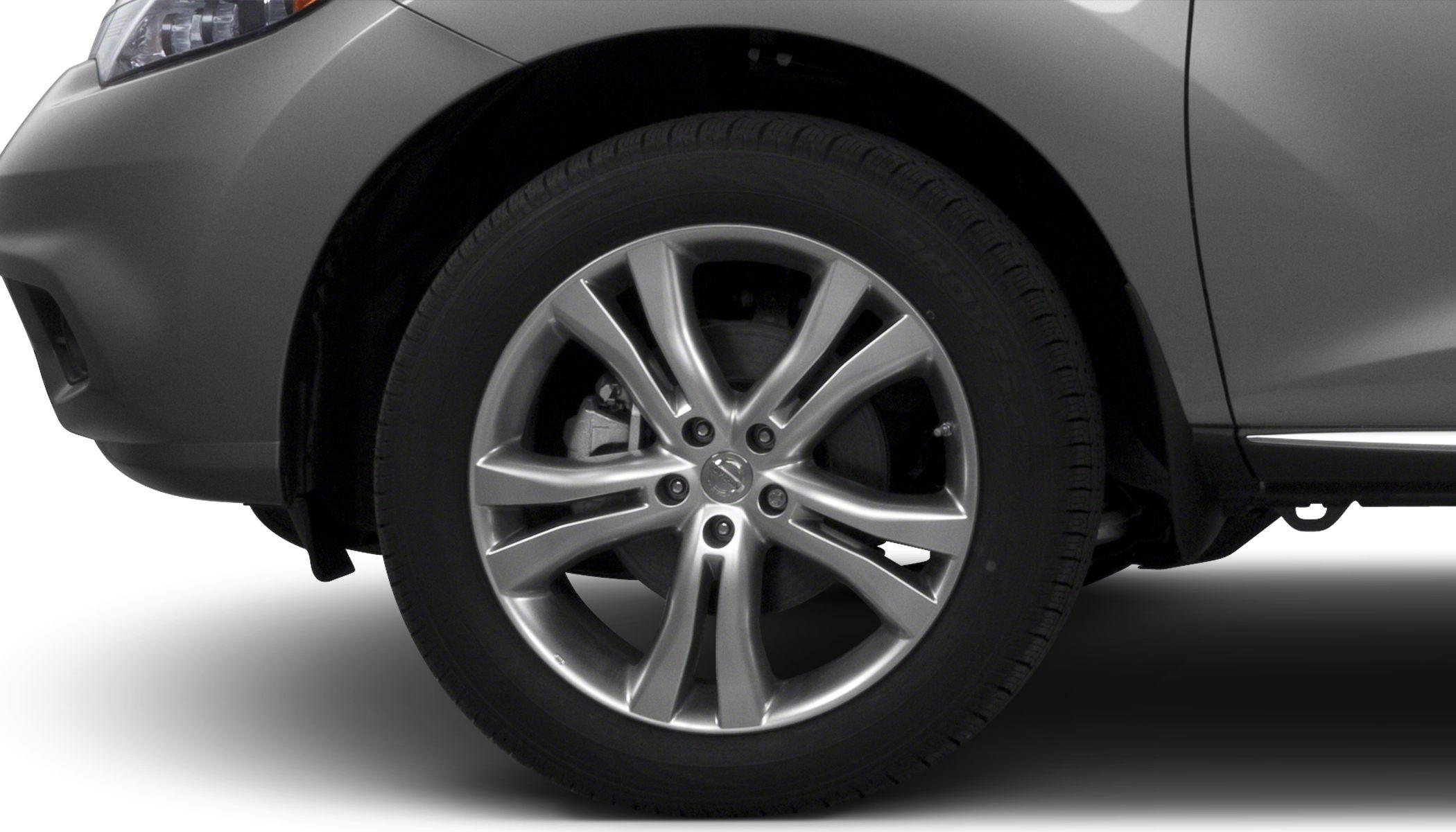 18-inch multi-spoke alloy wheel with tire on vehicle front side