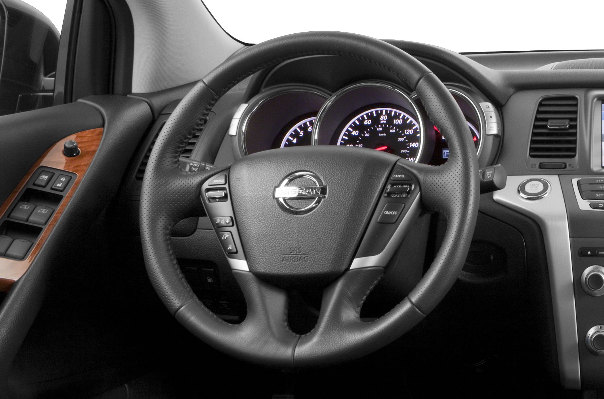 Leather steering wheel with multifunction buttons and illuminated instrument cluster.