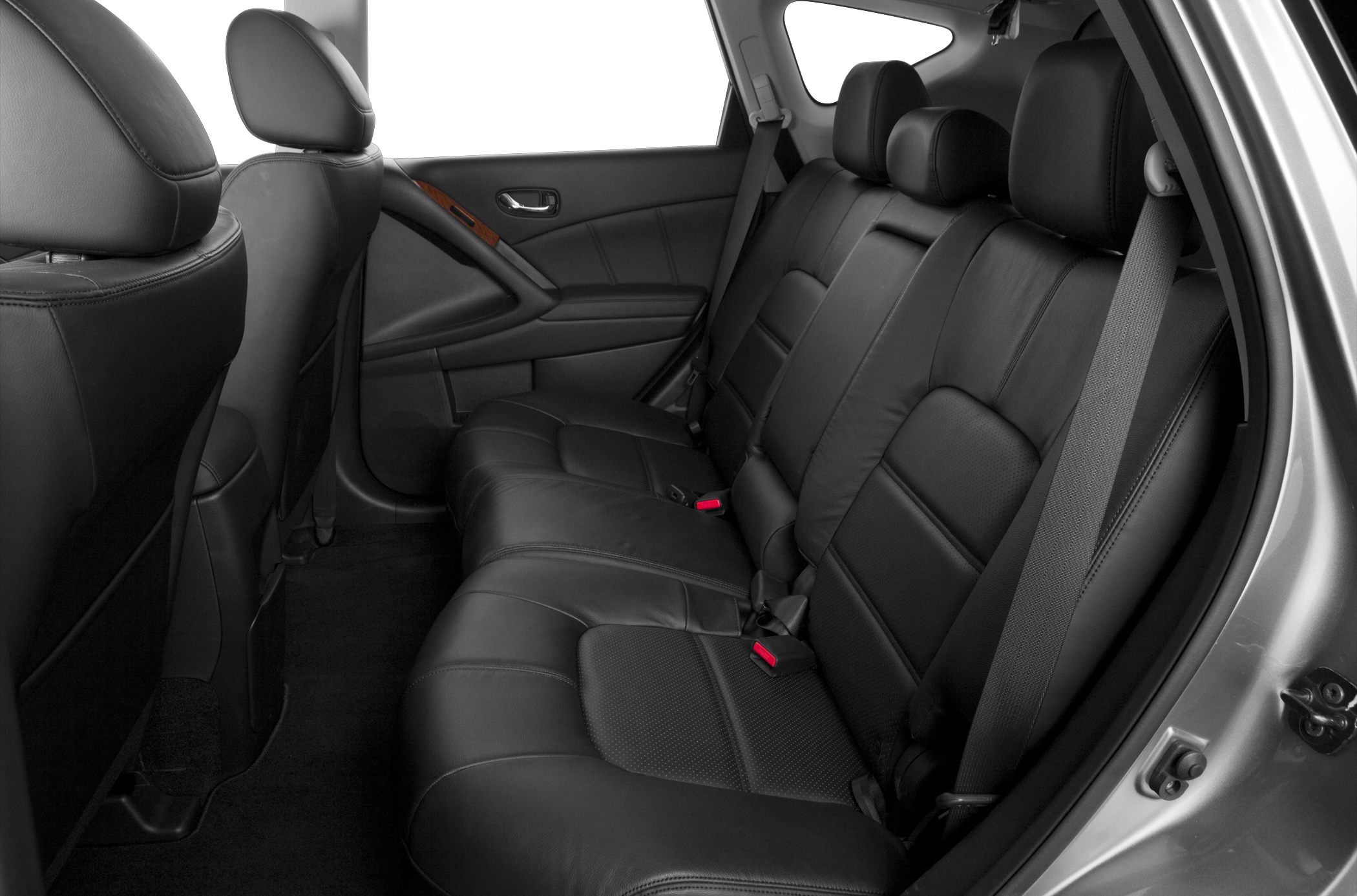 Rear interior with black leather seats and seat belts