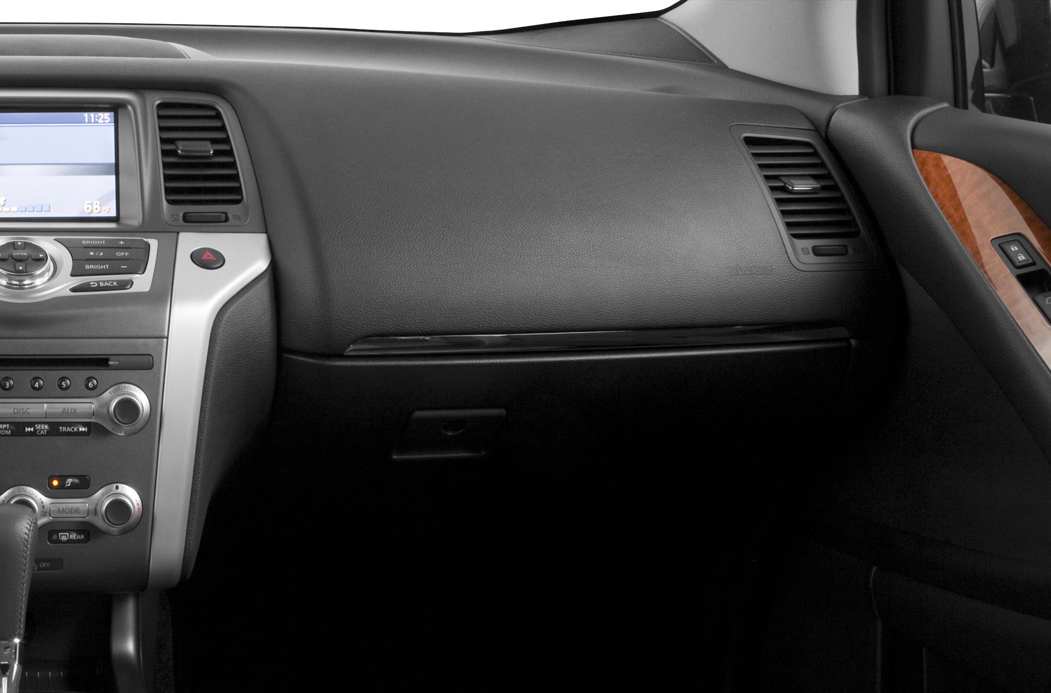 Dashboard, center console, door panel with wood trim and controls