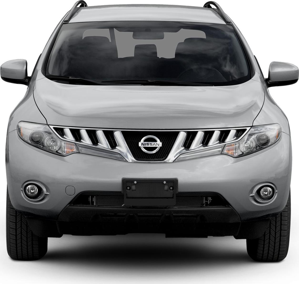 Front grille with vertical chrome slats and clear headlight clusters