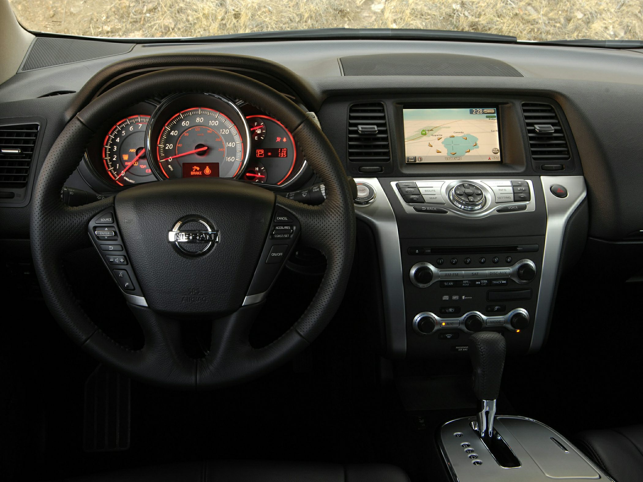 Multifunction steering wheel and central dashboard with navigation display