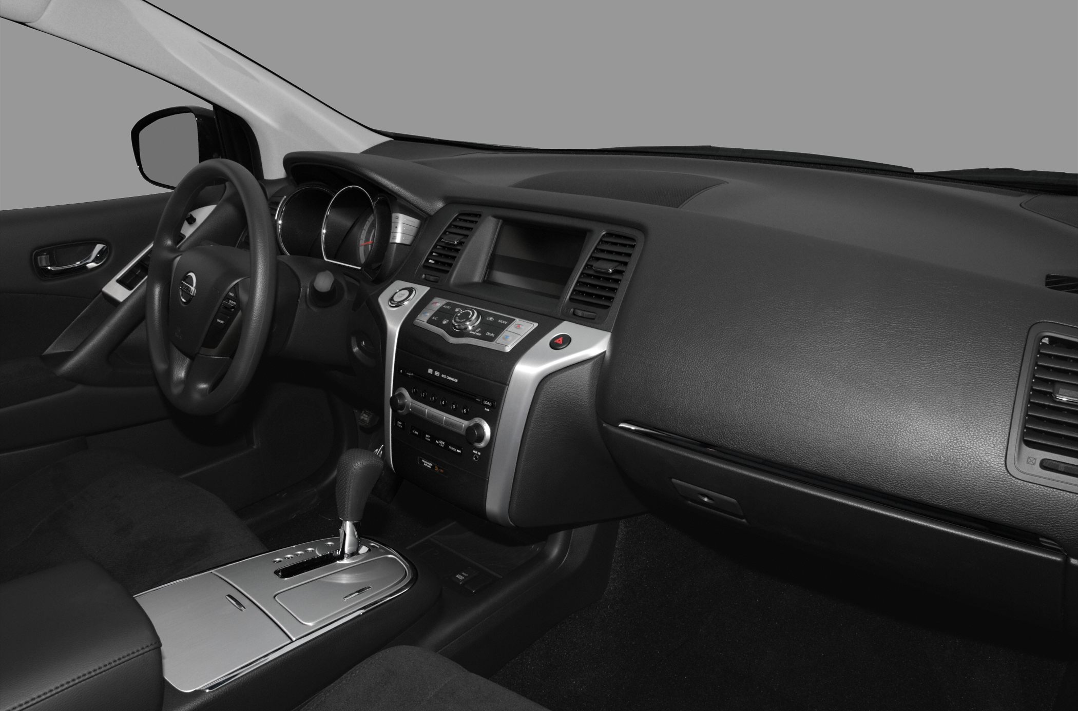 Interior dashboard and center console with gear shift and steering wheel