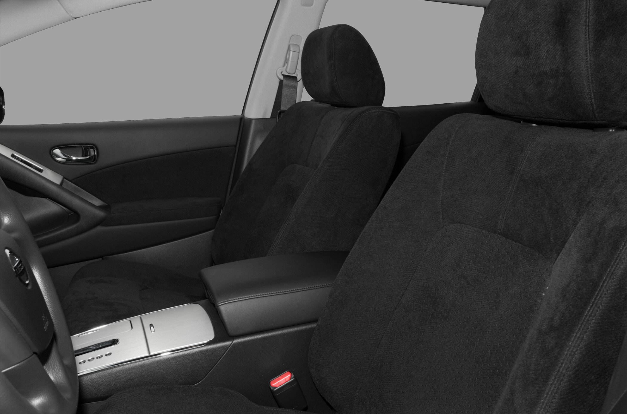 Front seats and center console with upholstery and armrest