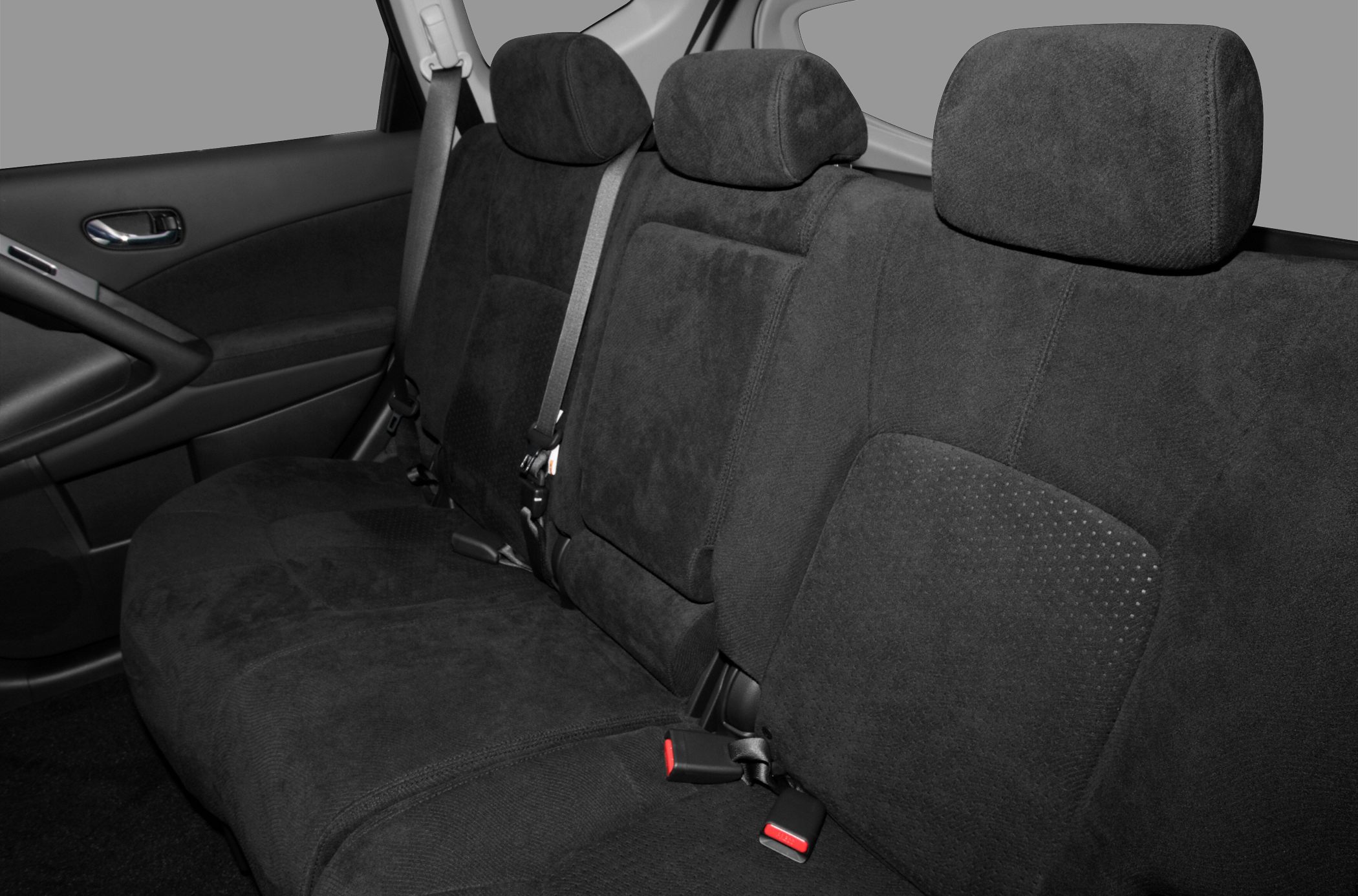 Rear seats with black upholstery and seat belts