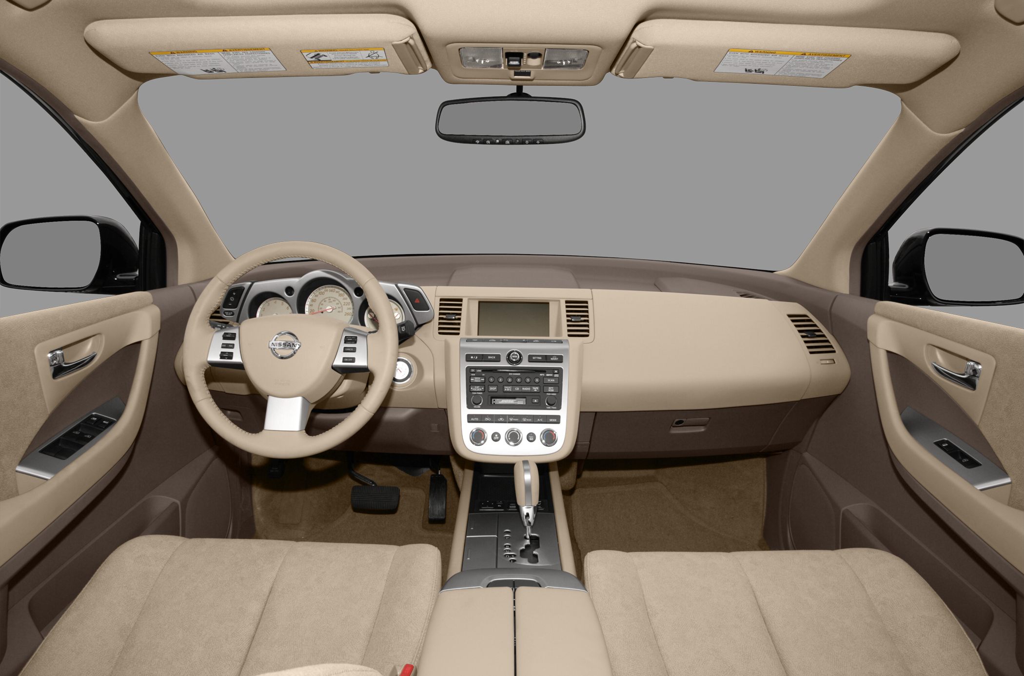 Beige dashboard, steering wheel, center console interior