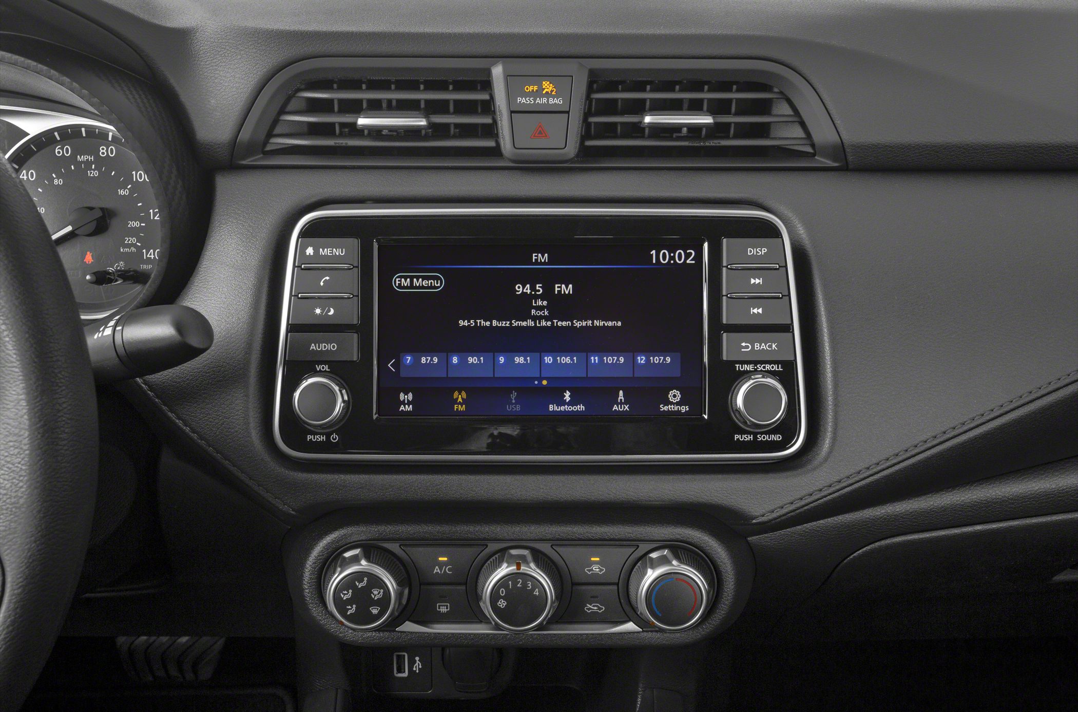Touchscreen infotainment system and manual climate control dials