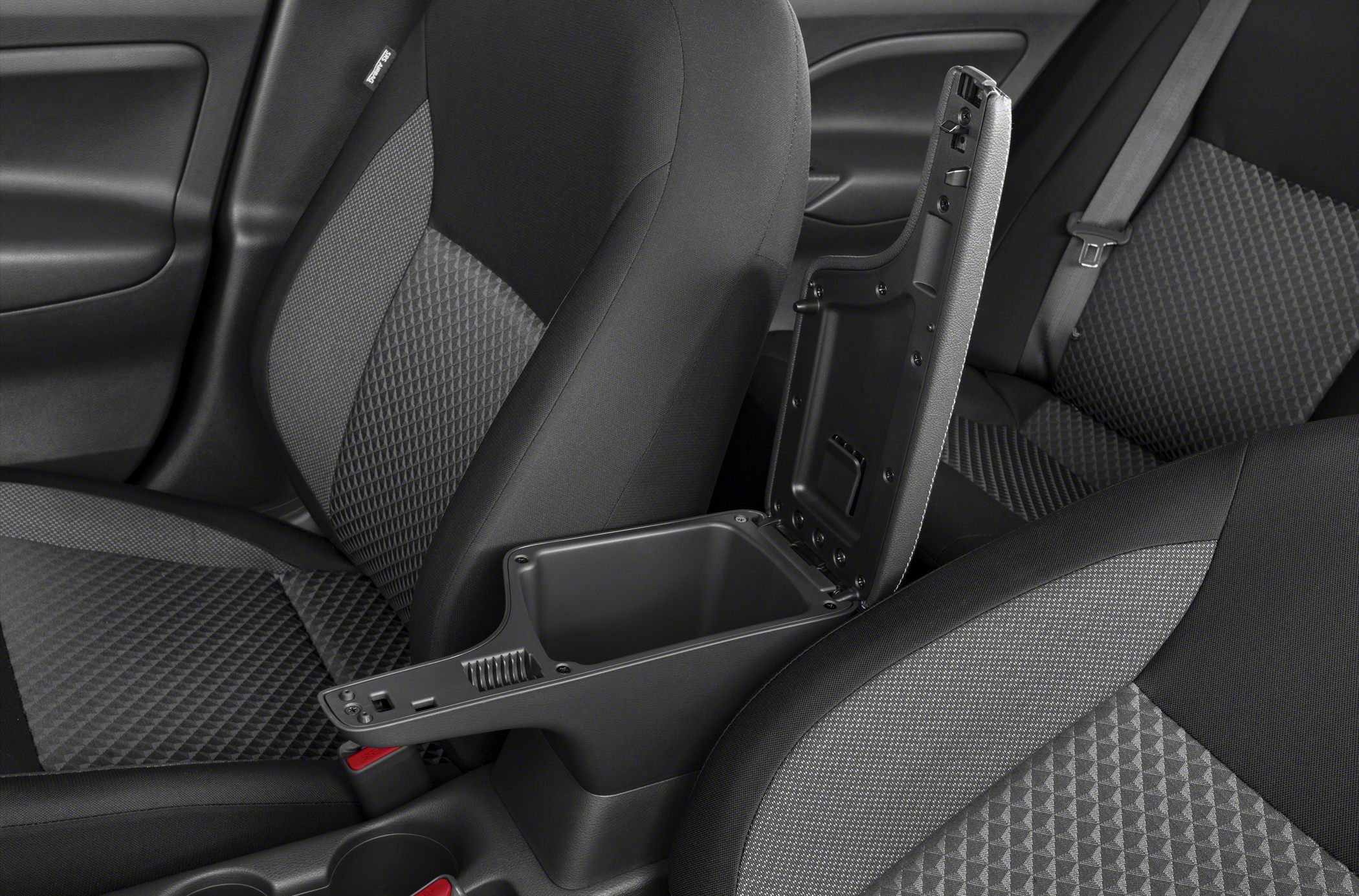 Central storage console with fabric-covered car seats
