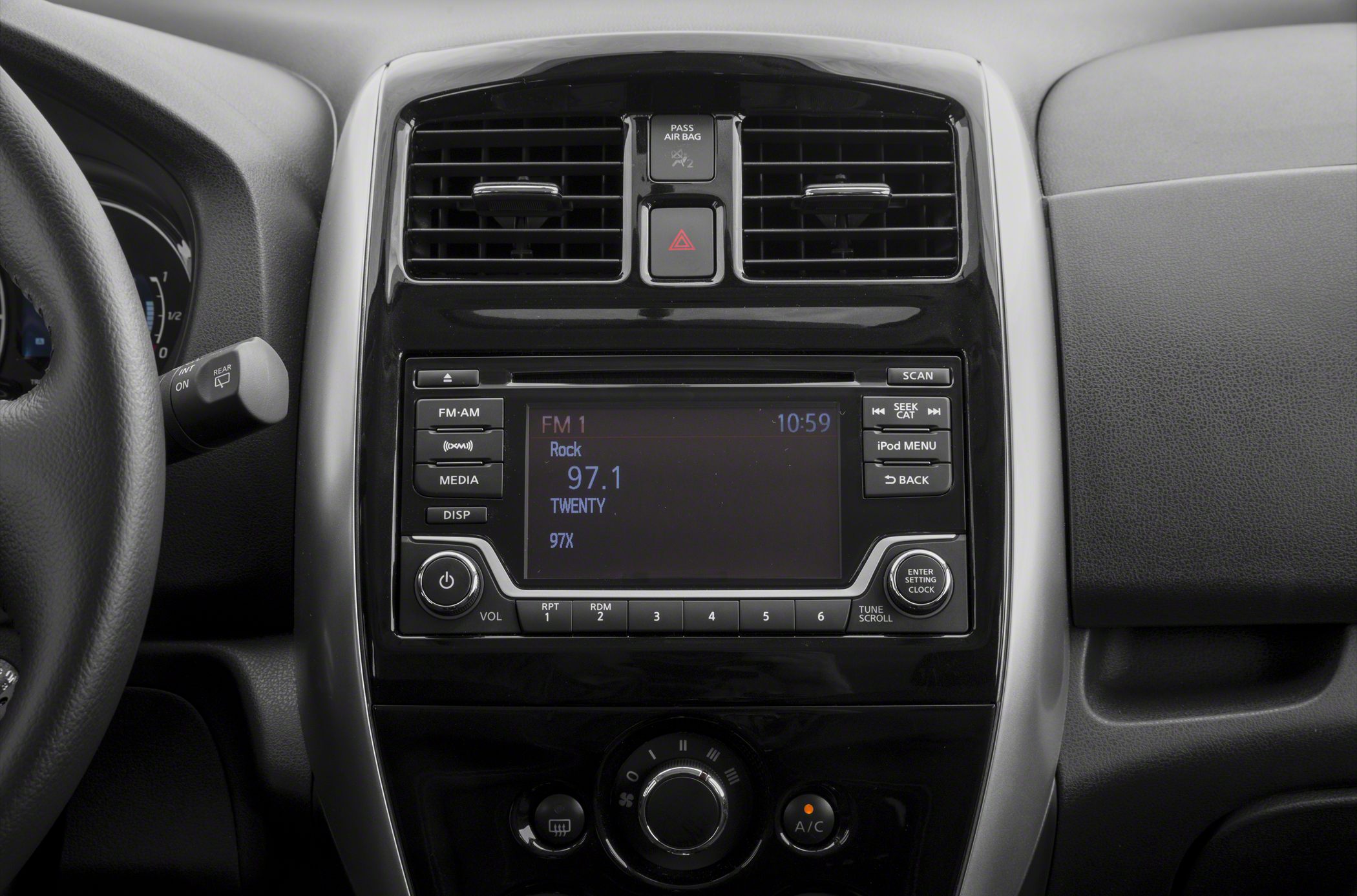 Car center console with audio system and climate controls