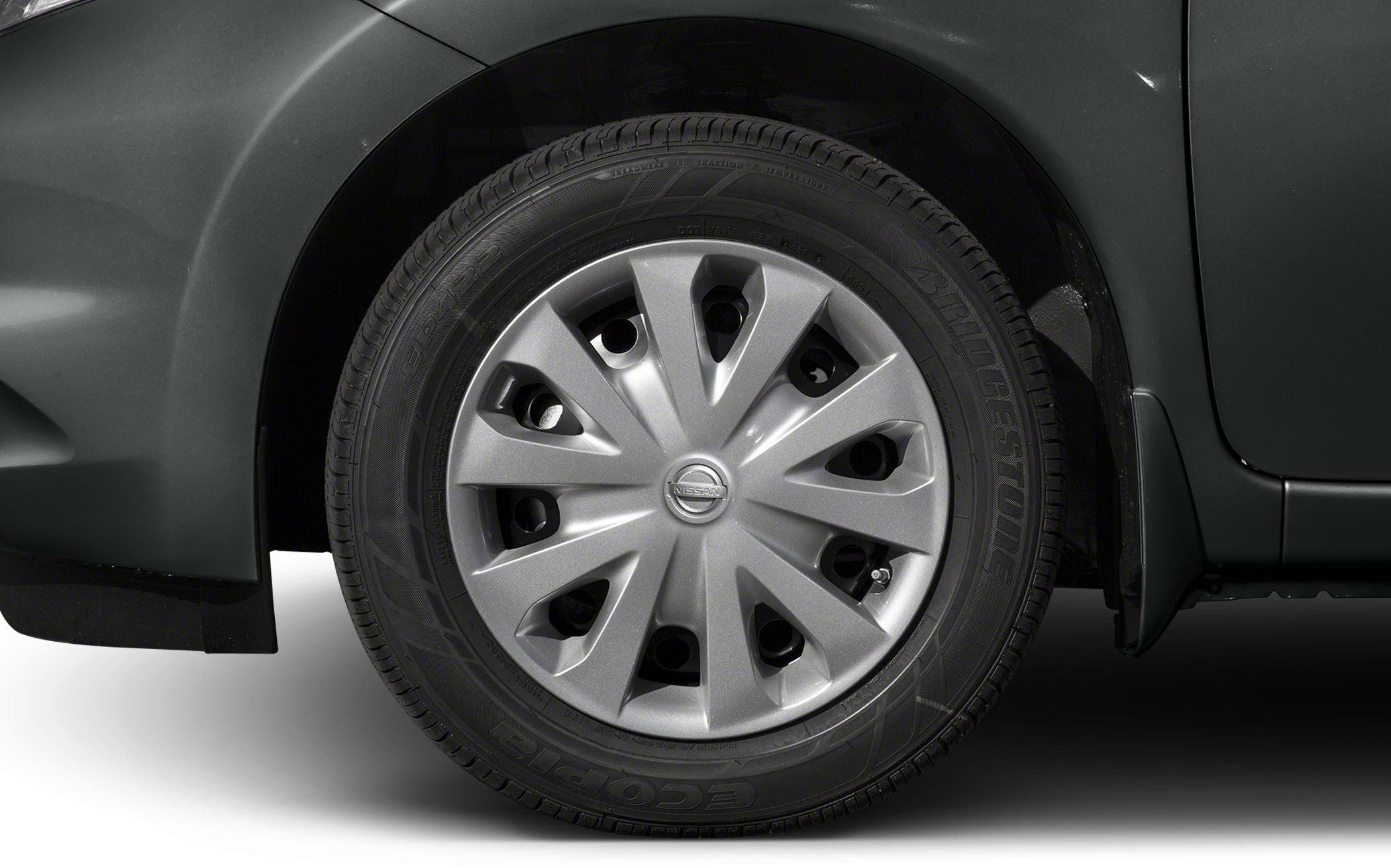 Close-up of a car wheel with hubcap and Bridgestone Ecopia tire