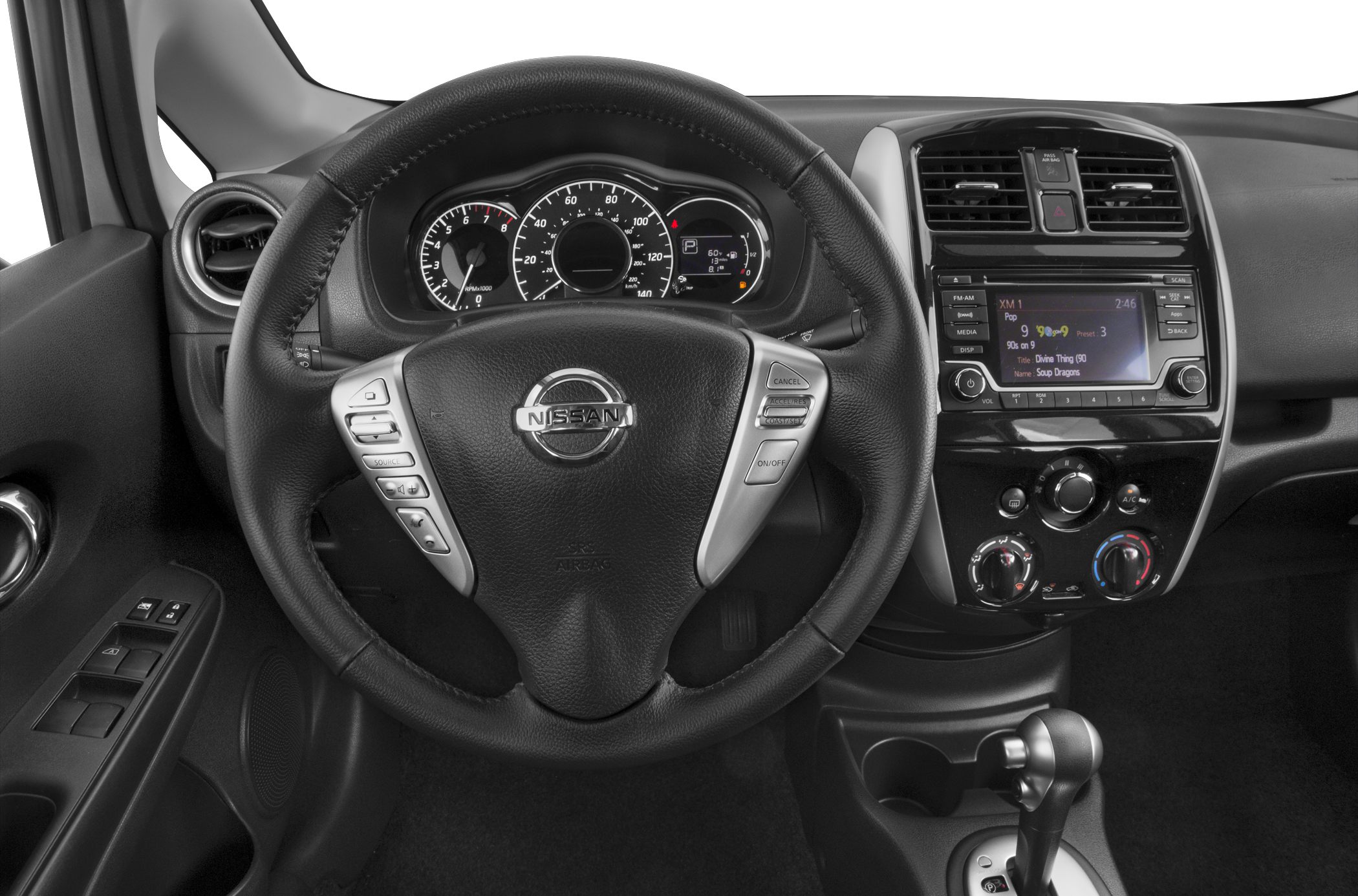 Steering wheel with control buttons and dashboard multimedia display.