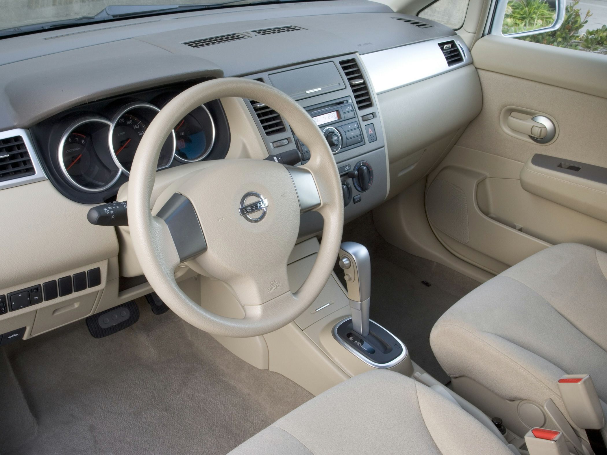 Dashboard and steering wheel with center console and gear shift