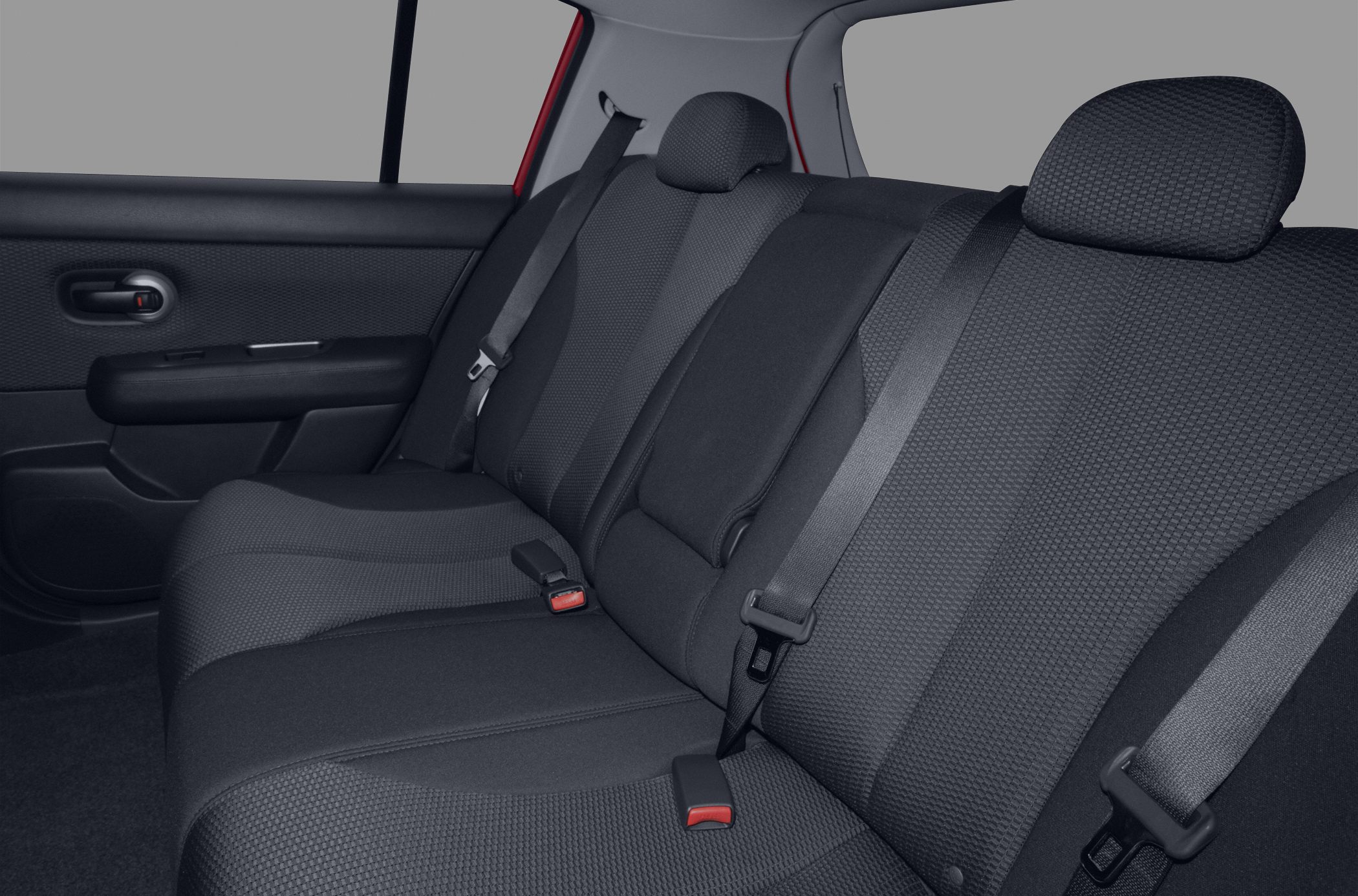 Rear seat interior with black textured fabric and seat belts