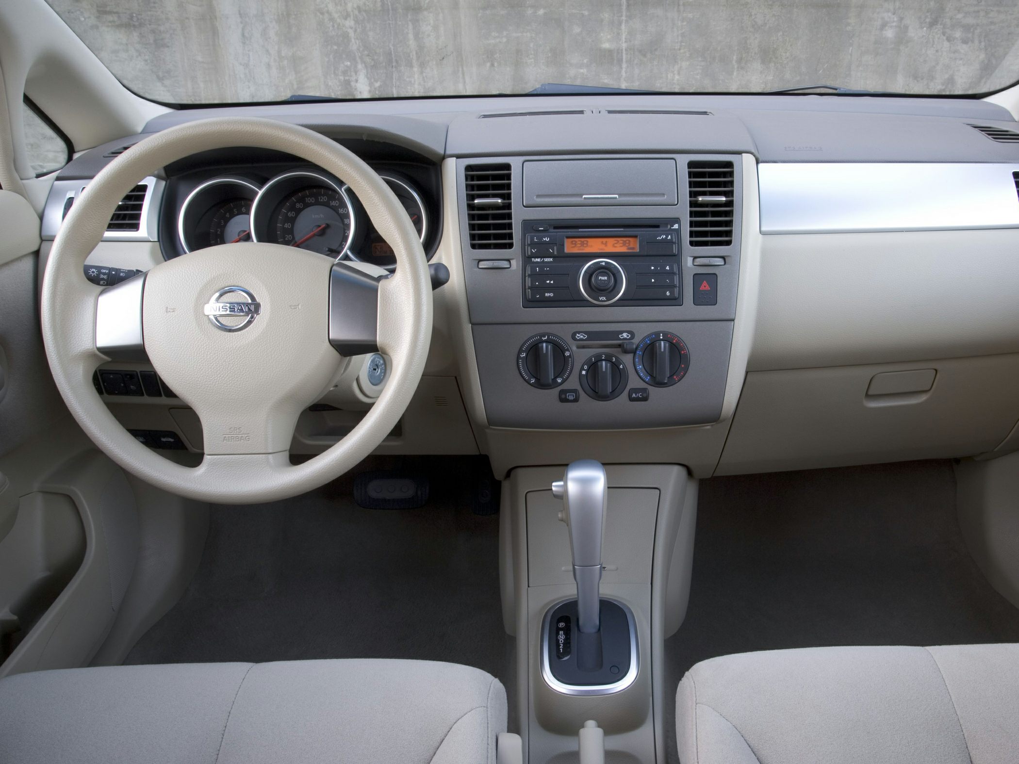 Dashboard, steering wheel, and gear shifter with instrument panel and controls