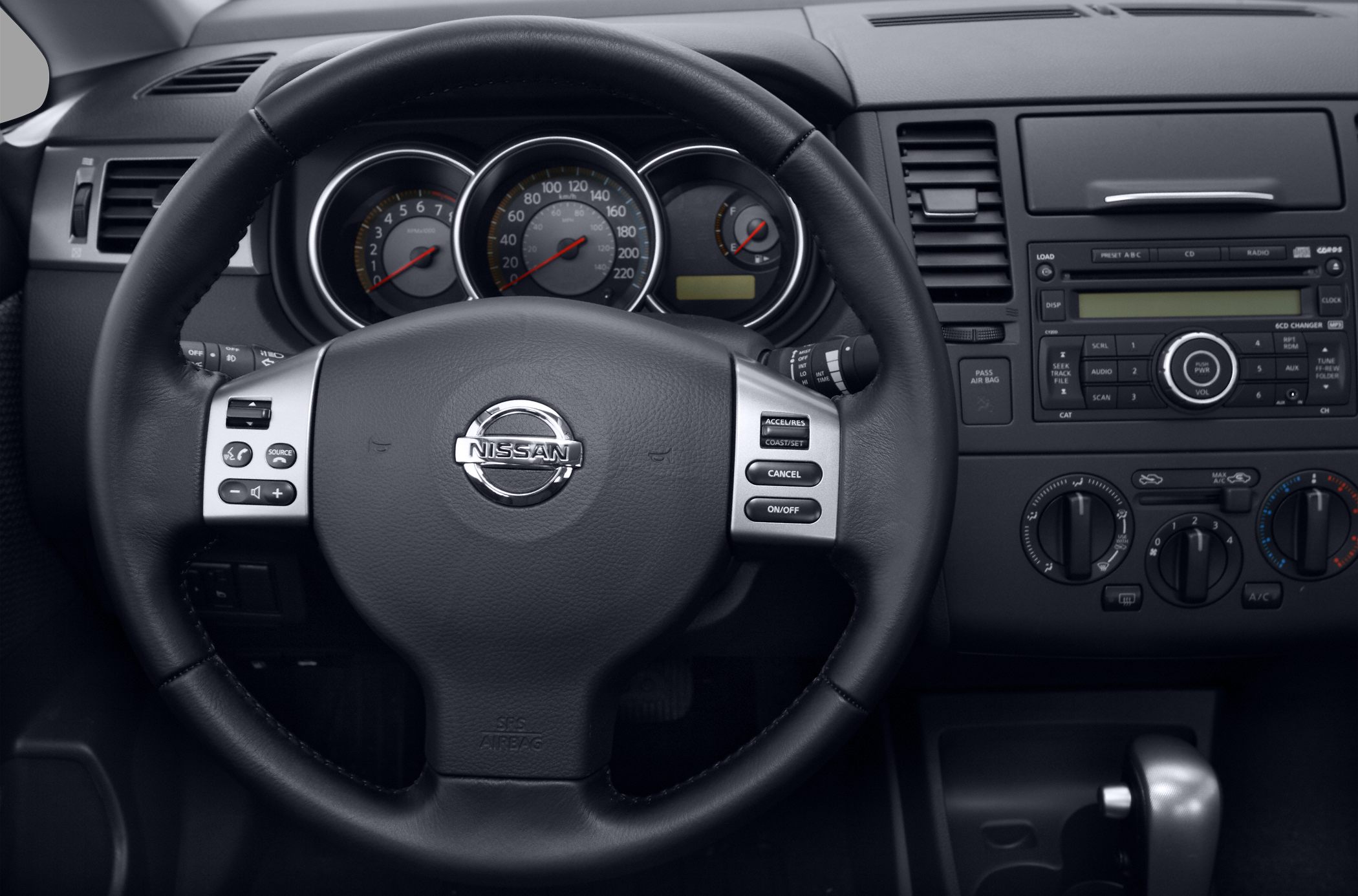Steering wheel with controls and dashboard instrument cluster