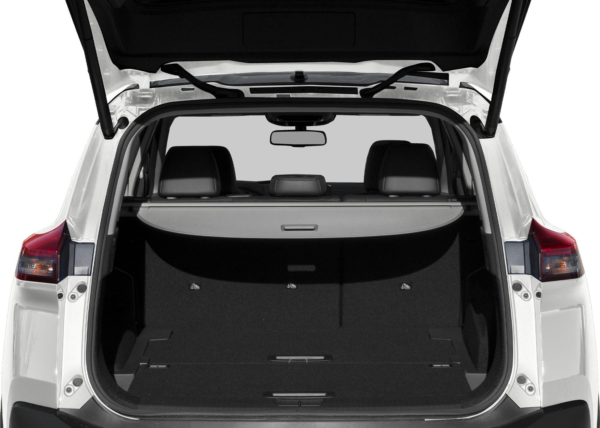 Open rear cargo space with retractable cover and rear seats.